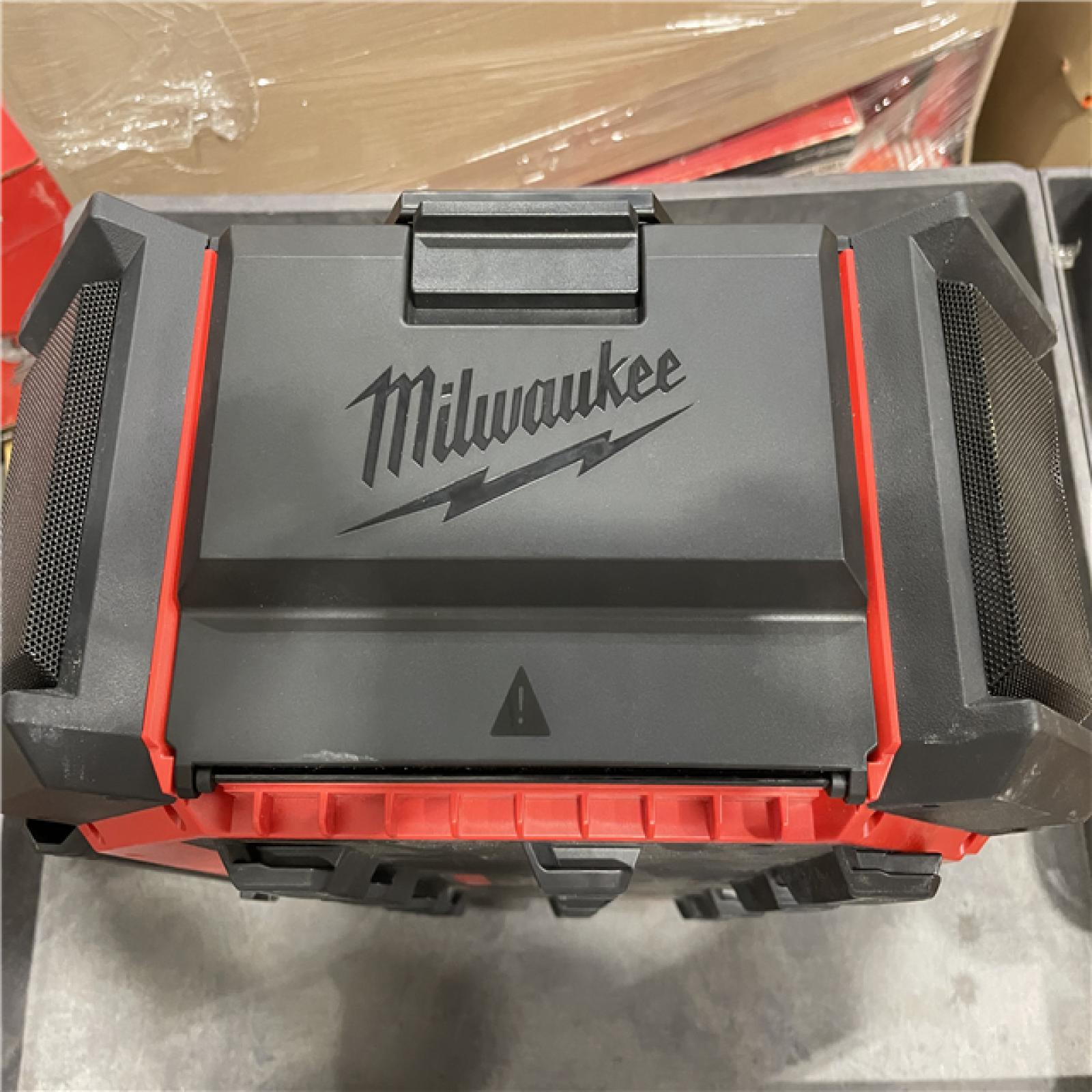 AS-IS Milwaukee M18 Lithium-Ion Cordless PACKOUT Radio/Speaker with Built-in Charger (Tool Only)