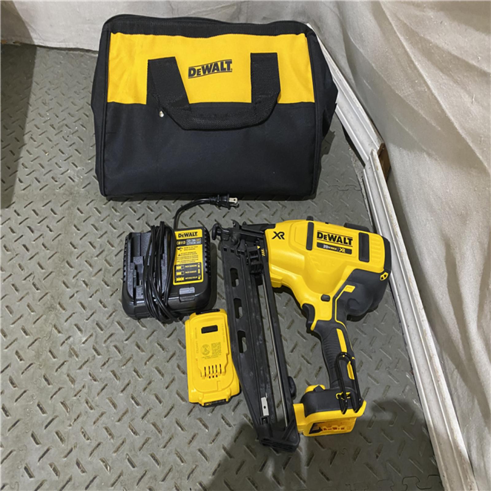 Houston location AS-IS DeWalt DCN660D1 20V 16 Gauge Cordless Angled Finish Nailer Kit W/ 2Ah Battery