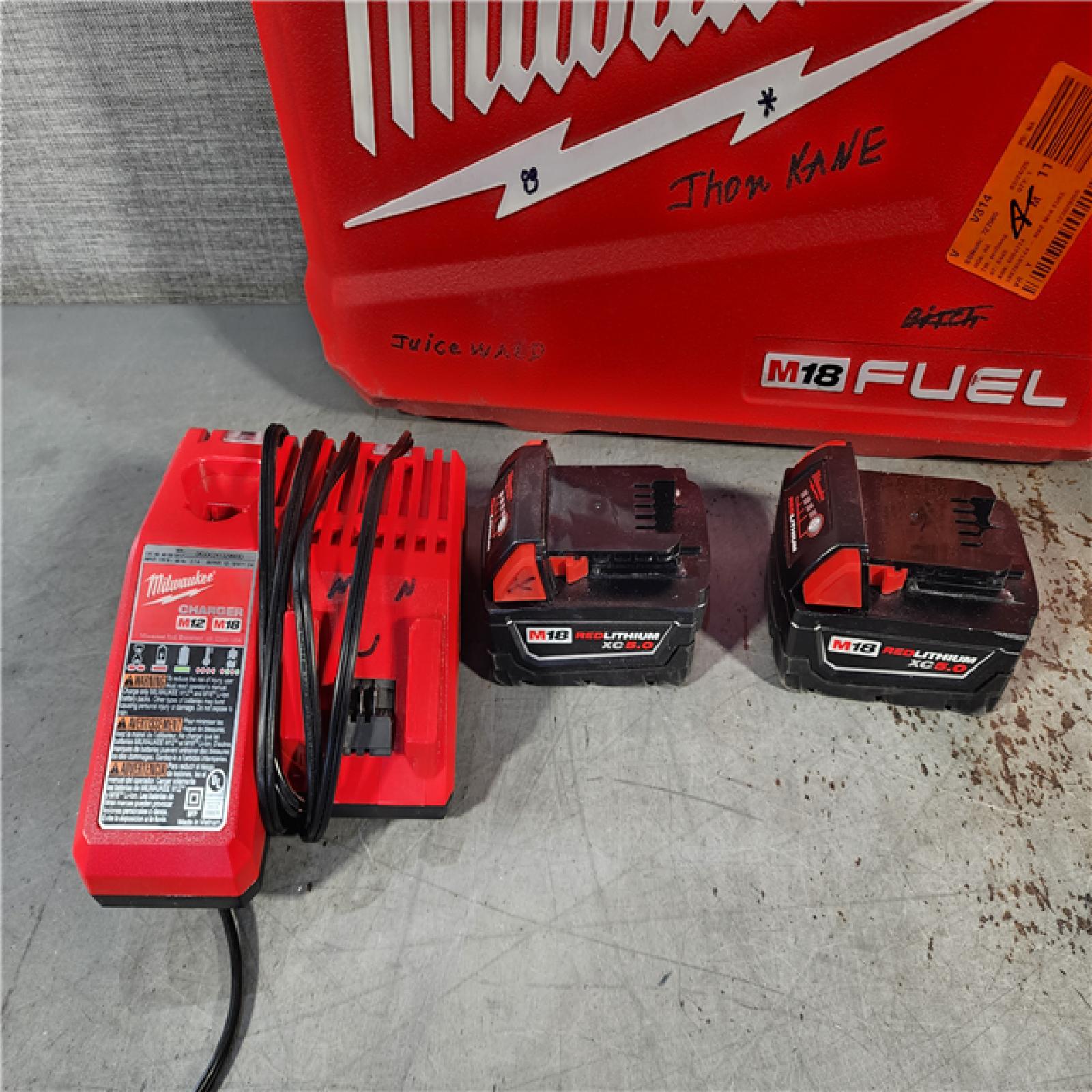 HOUSTON LOCATION - AS-IS Milwaukee M18 FUEL 18V Lithium-Ion Brushless Cordless Hammer Drill and Impact Driver Combo Kit (2-Tool) with 2 Batteries