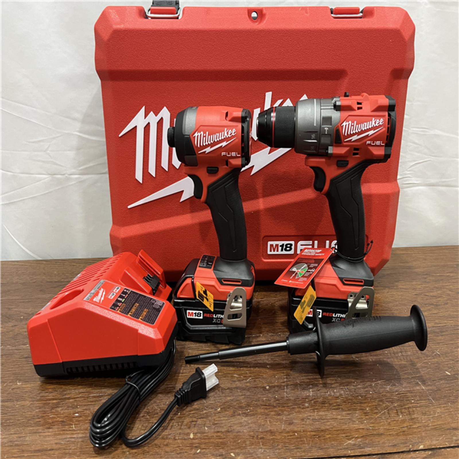 AS-ISMilwaukee M18 FUEL 18V Lithium-Ion Brushless Cordless Hammer Drill and Impact Driver Combo Kit (2-Tool) with 2 Batteries