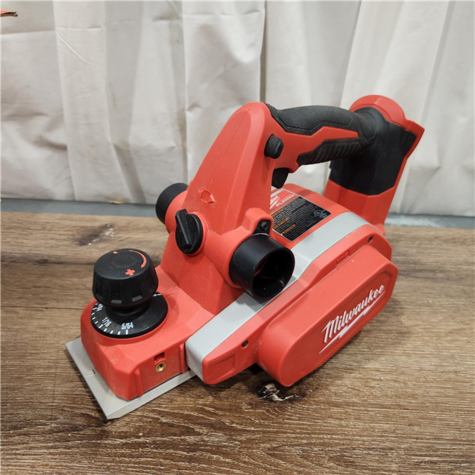 AS-IS Milwaukee M18 18-Volt Lithium-Ion Cordless 3-1/4 in. Planer (Tool-Only)