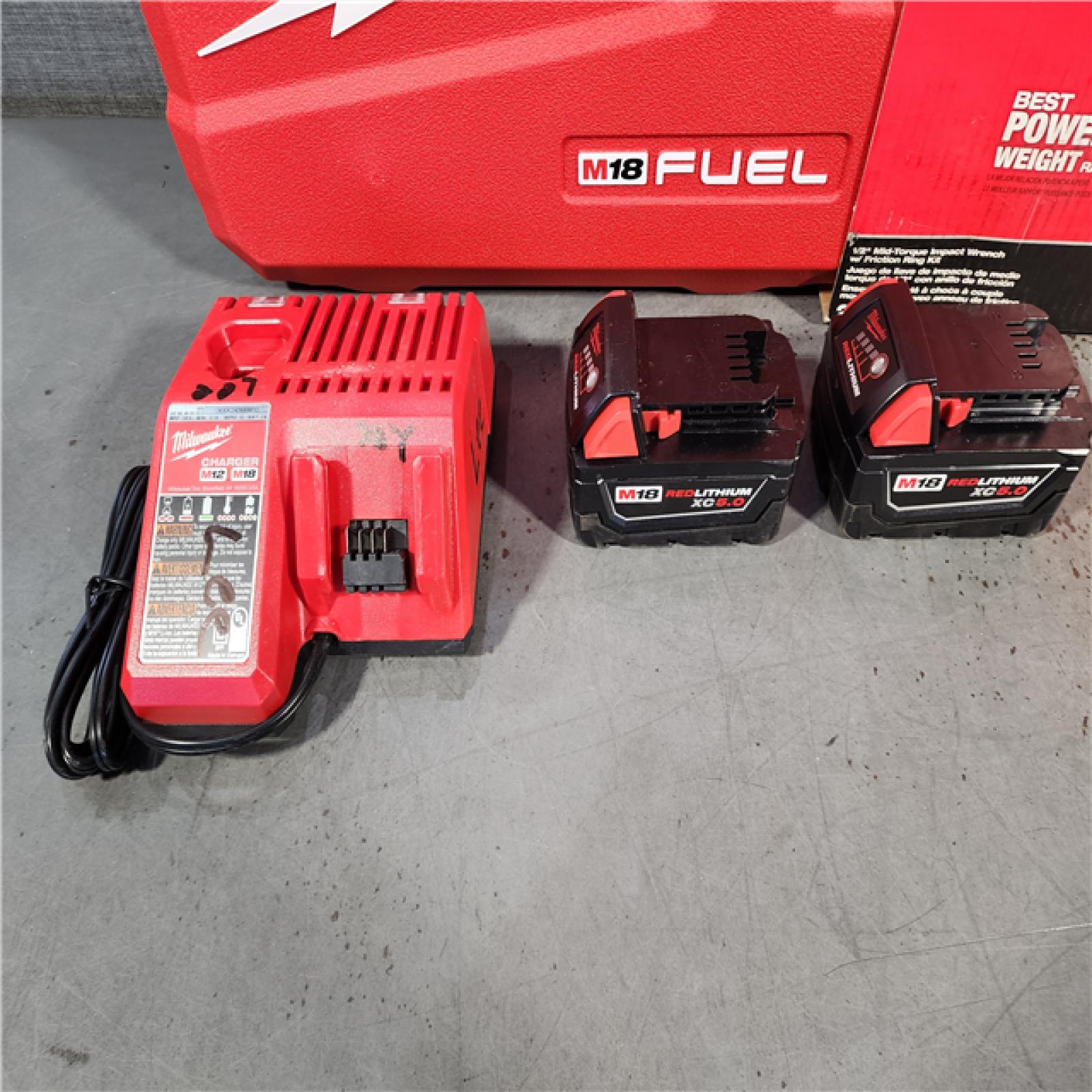 HOUSTON LOCATION - AS-IS (APPEARS LIKE NEW) Milwaukee M18 FUEL 1/2 in. Cordless Brushless Mid-Torque Impact Wrench Kit (Battery & Charger)