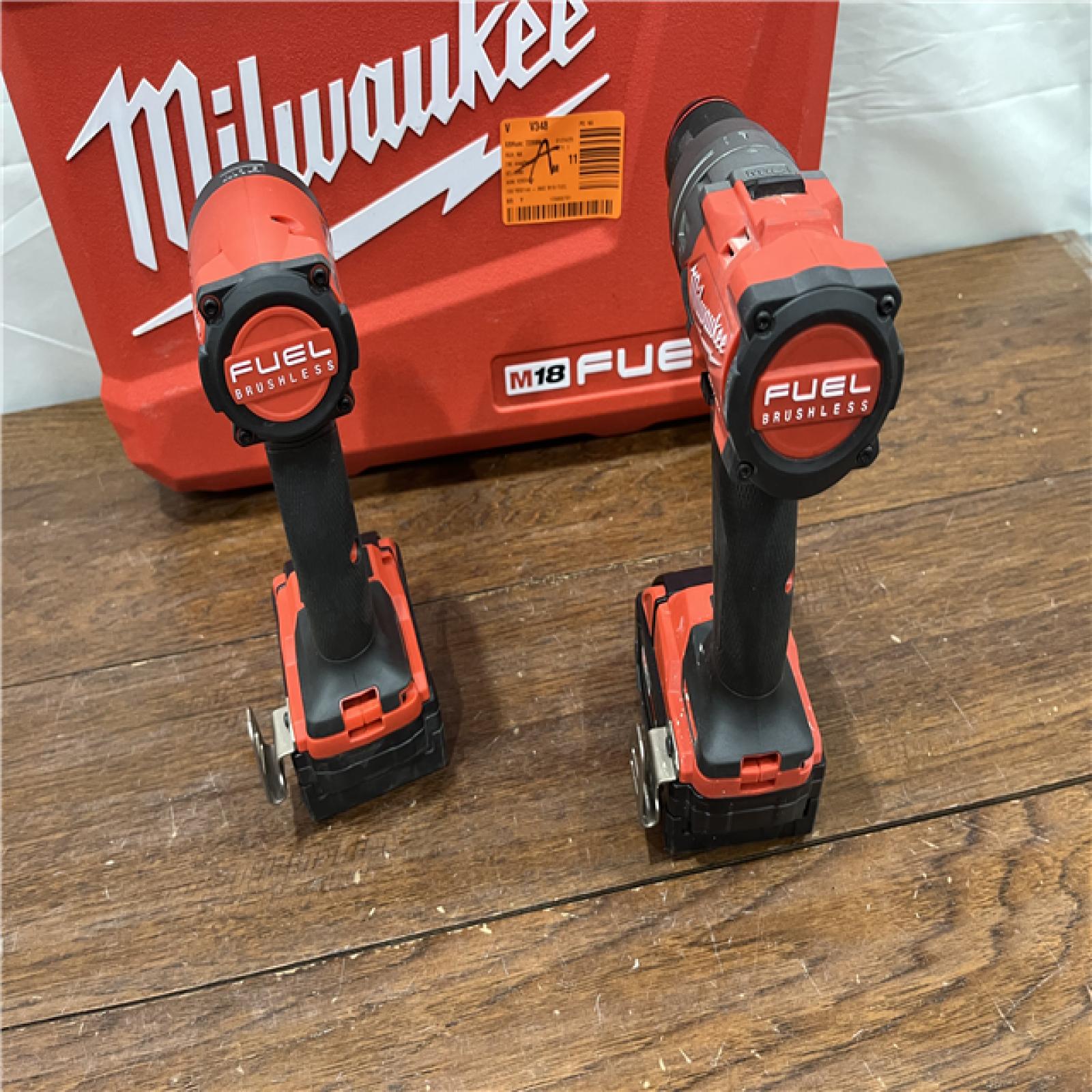 AS--IS Milwaukee M18 FUEL 18V Lithium-Ion Brushless Cordless Hammer Drill and Impact Driver Combo Kit (2-Tool) with 2 Batteries