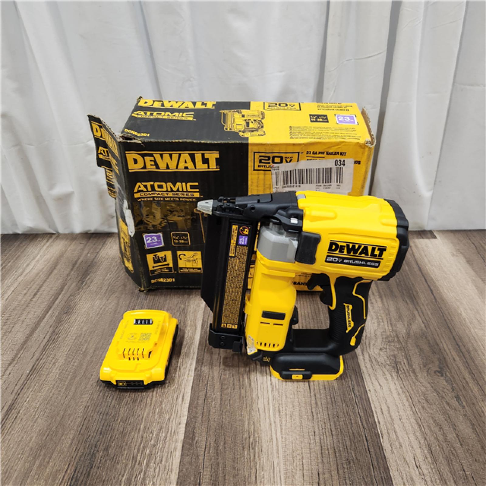 AS IS DEWALT ATOMIC 20V MAX Lithium Ion Cordless 23 Gauge Pin Nailer Kit with 3.0Ah Battery and Charger