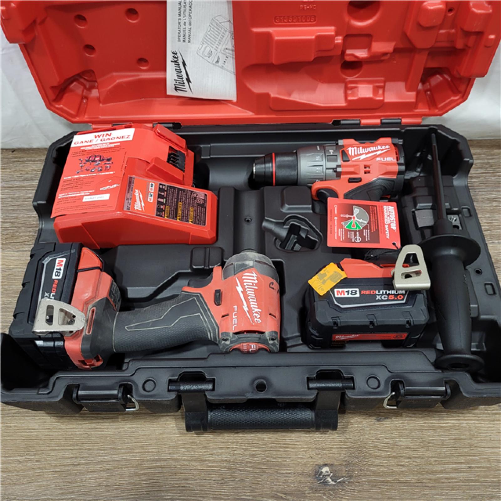 AS-IS Milwaukee M18 FUEL 18V Lithium-Ion Brushless Cordless Hammer Drill and Impact Driver Combo Kit (2-Tool) with 2 Batteries