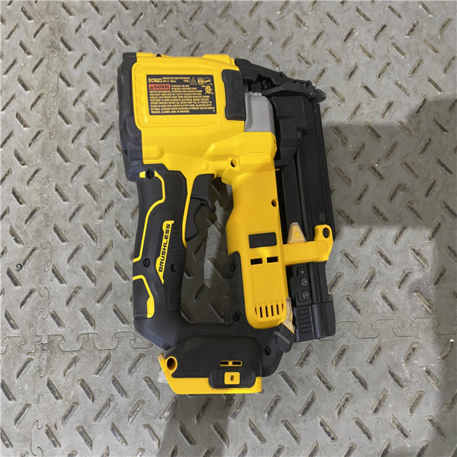 Houston location AS-IS DEWALT ATOMIC 20V MAX Lithium Ion Cordless 23 Gauge Pin Nailer Kit with 2.0Ah Battery and Charger