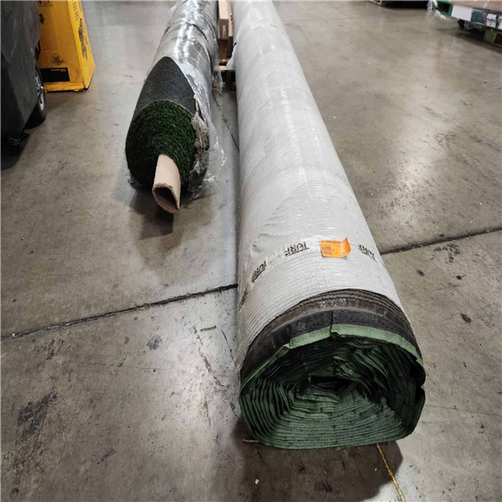 Phoenix Location 1st Roll TURF DISTRIBUTORS Eco 72 Deep Green 15 ft. Wide x Cut to Length Artificial Turf (Quantity: 615) 2nd Roll TrafficMaster TruGrass Emerald 12 ft. Wide x Cut to Length Green Artificial Grass Turf Pallet