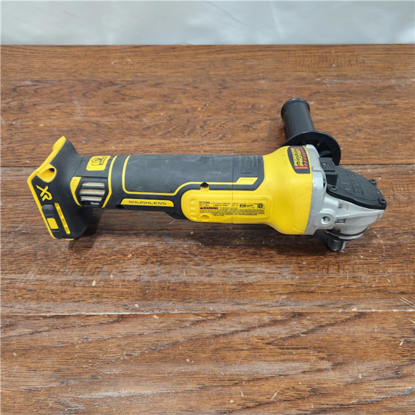 AS-IS DeWalt DCG405B 20V Max XR 4.5-Inch Slide Switch Small Angle Grinder (Tool Only)