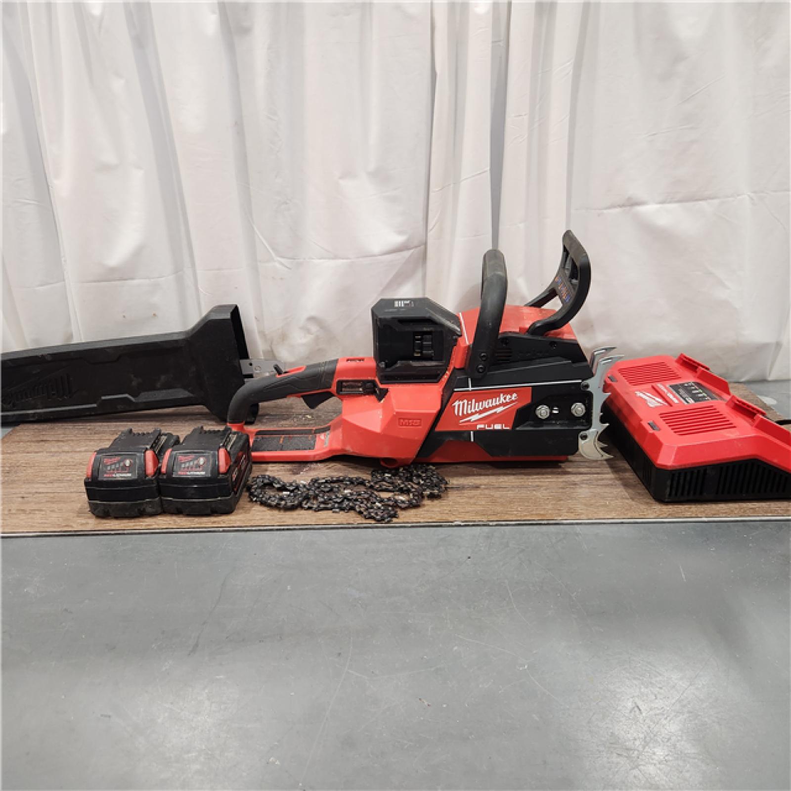 AS IS Milwaukee M18 FUEL Cordless 20 in. Chainsaw Kit