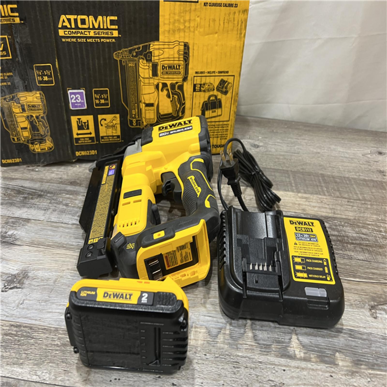 AS-IS DeWalt DCN623D1 20-Volt MAX Atomic Compact Cordless Pin Nailer Kit  Brushless Motor  23 Gauge  Battery - Quantity 1