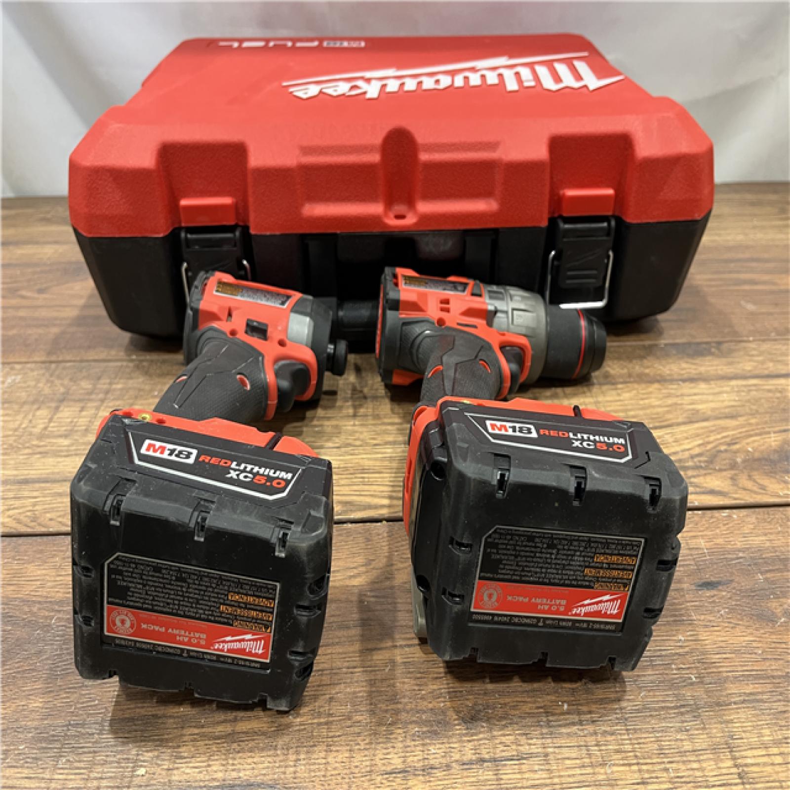 AS IS Milwaukee M18 FUEL 18V Lithium-Ion Brushless Cordless Hammer Drill and Impact Driver Combo Kit (2-Tool) with 2 Batteries