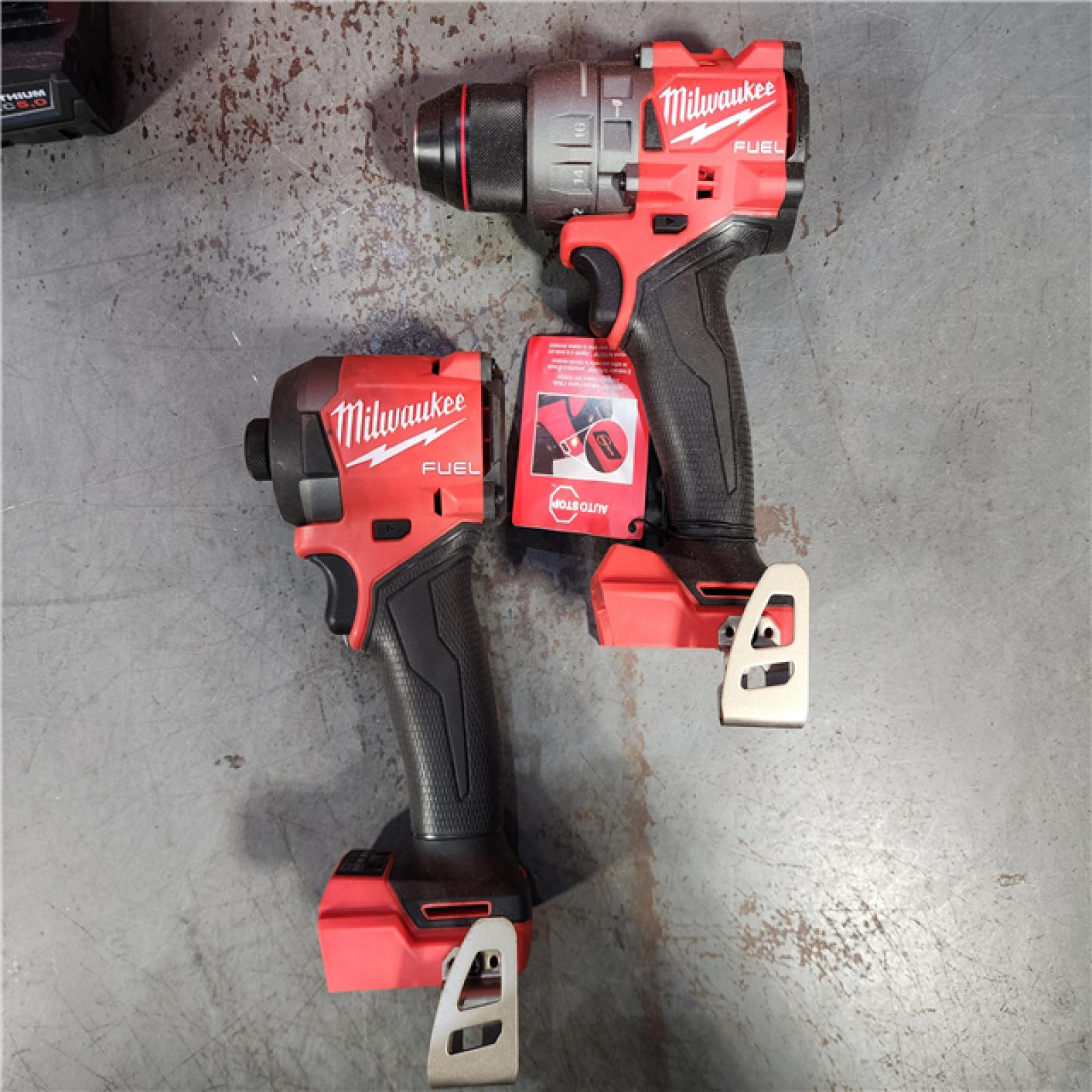 HOUSTON LOCATION - AS-IS (APPEARS LIKE NEW) Milwaukee M18 FUEL 18V Lithium-Ion Brushless Cordless Hammer Drill and Impact Driver Combo Kit (2-Tool) with 2 Batteries