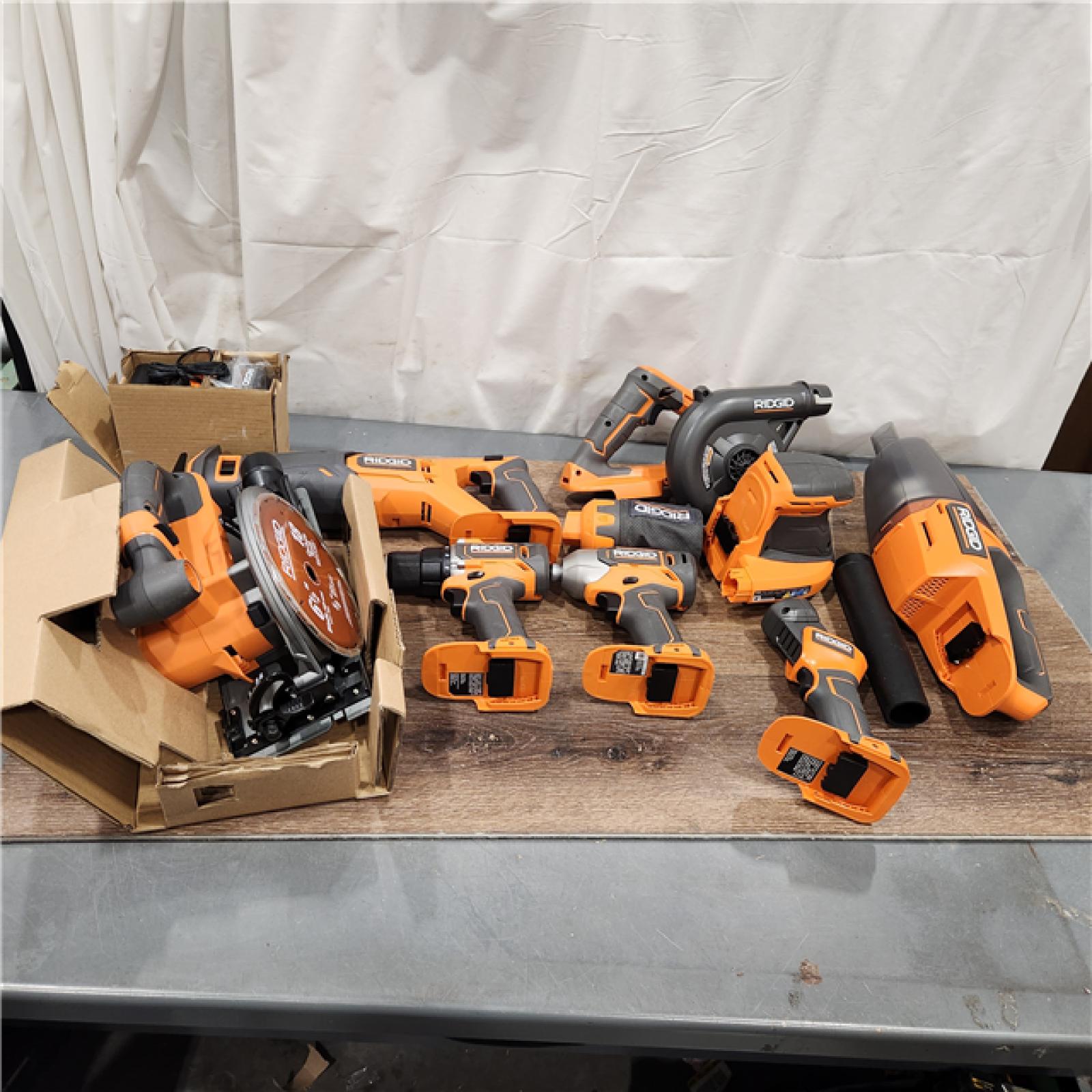 AS-IS 18V Cordless 8-Tool Combo Kit with 2.0 Ah Battery, 4.0 Ah Battery, Charger, and Tool Bag