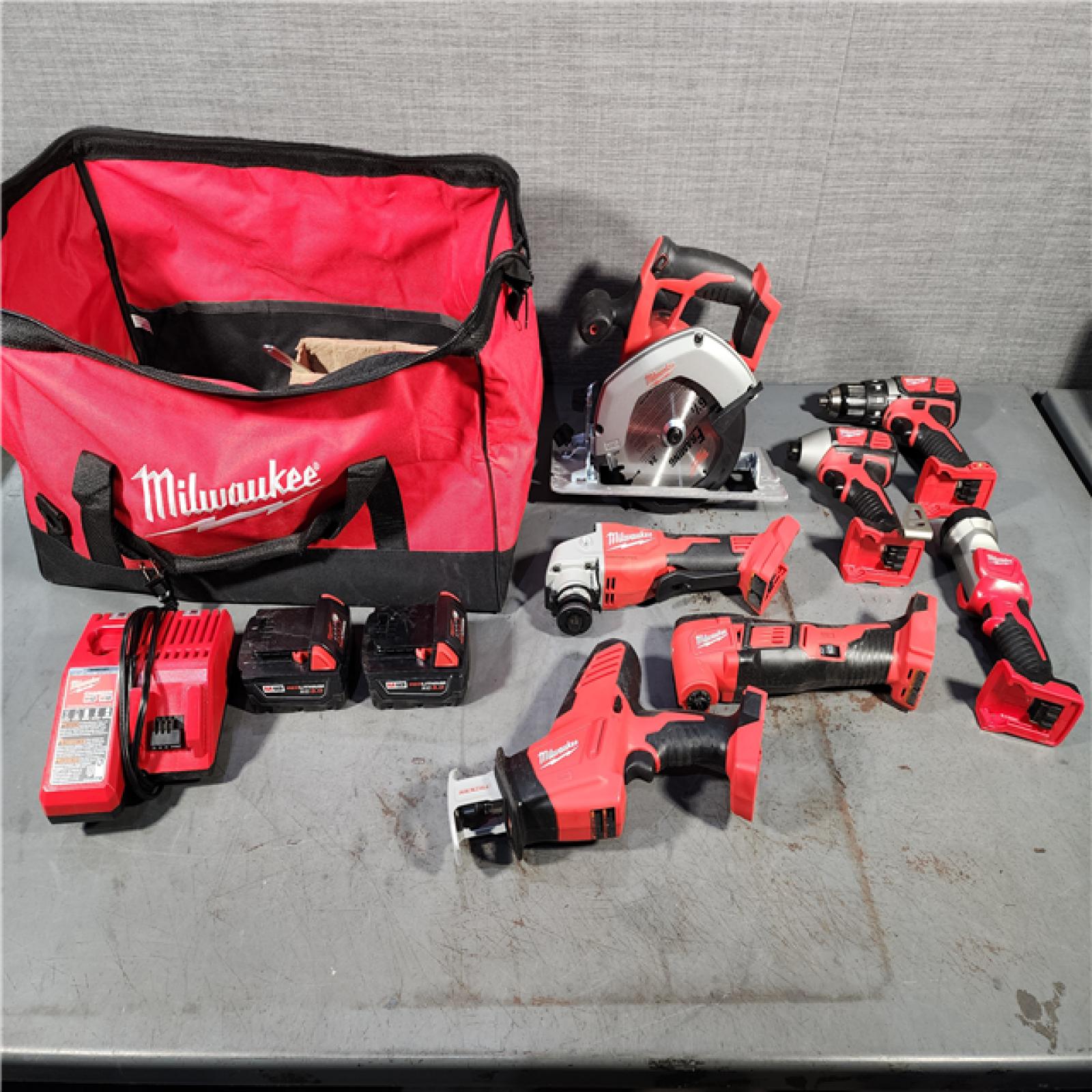 HOUSTON LOCATION - AS-IS MILWAUKEE 7 TOOL COMBO KIT W/ (2) 3.0 AH BATTERY, TOOL BAG & CHARGER