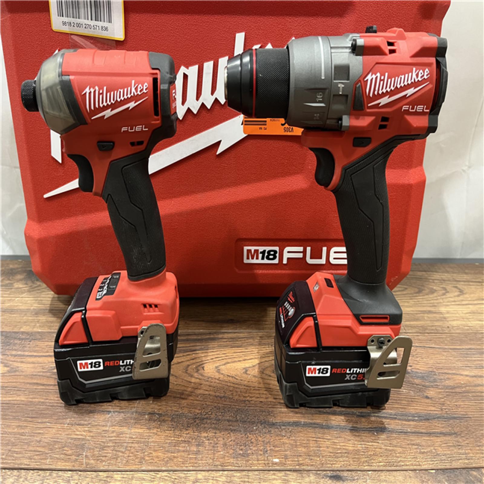 AS-IS Milwaukee M18 FUEL 18V Lithium-Ion Brushless Cordless Hammer Drill and Impact Driver Combo Kit (2-Tool) with 2 Batteries