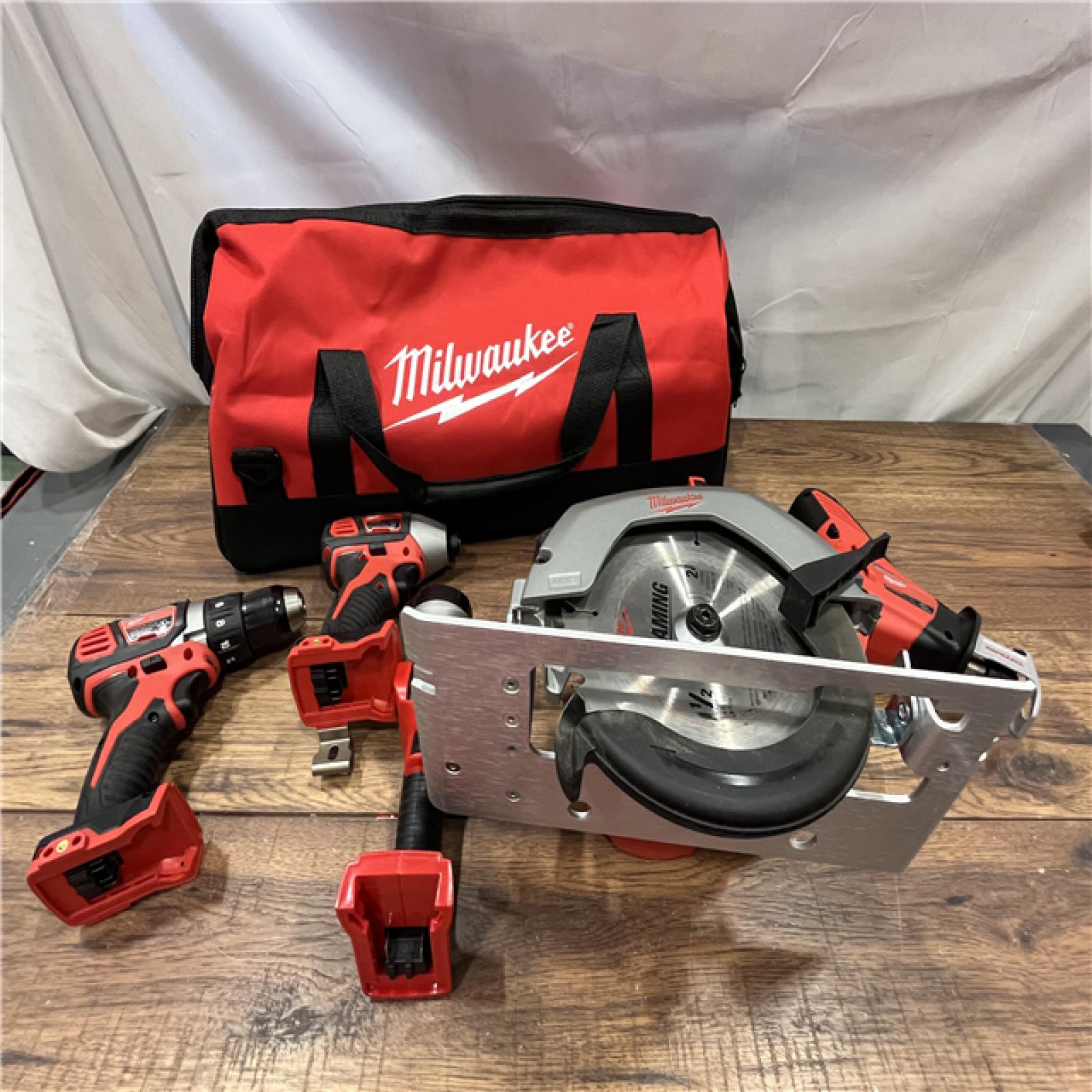 AS-IS Milwaukee M18 18-Volt Lithium-Ion Cordless Combo Tool Kit (5-Tool) with (1) 3.0Ah and (1) 1.5Ah Battery, (1) Charger, (1) Tool Bag