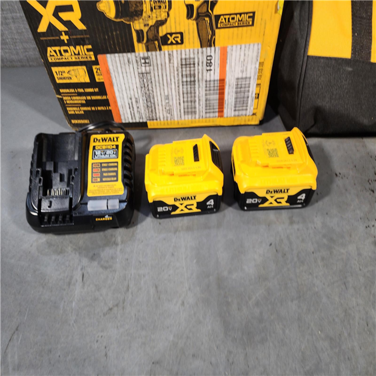 HOUSTON LOCATION - AS-IS DEWALT 20V MAX XR Hammer Drill and ATOMIC Impact Driver 2 Tool Cordless Combo Kit with (2) 4.0Ah Batteries, Charger, and Bag