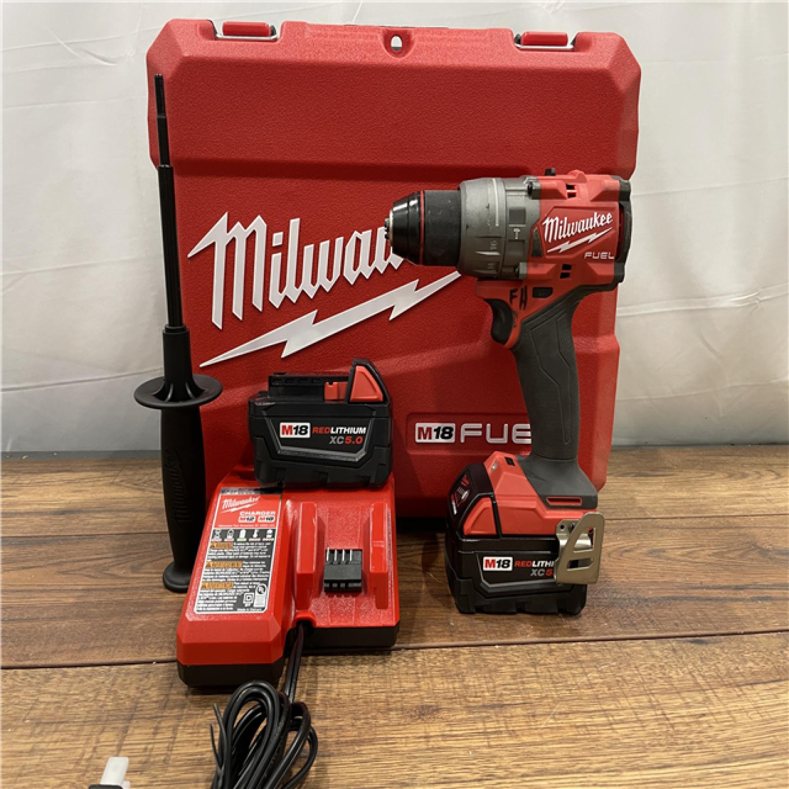 AS-IS Milwaukee M18 FUEL 18V Lithium-Ion Brushless Cordless 1/2 in. Hammer Drill Driver Kit with Two 5.0 Ah Batteries