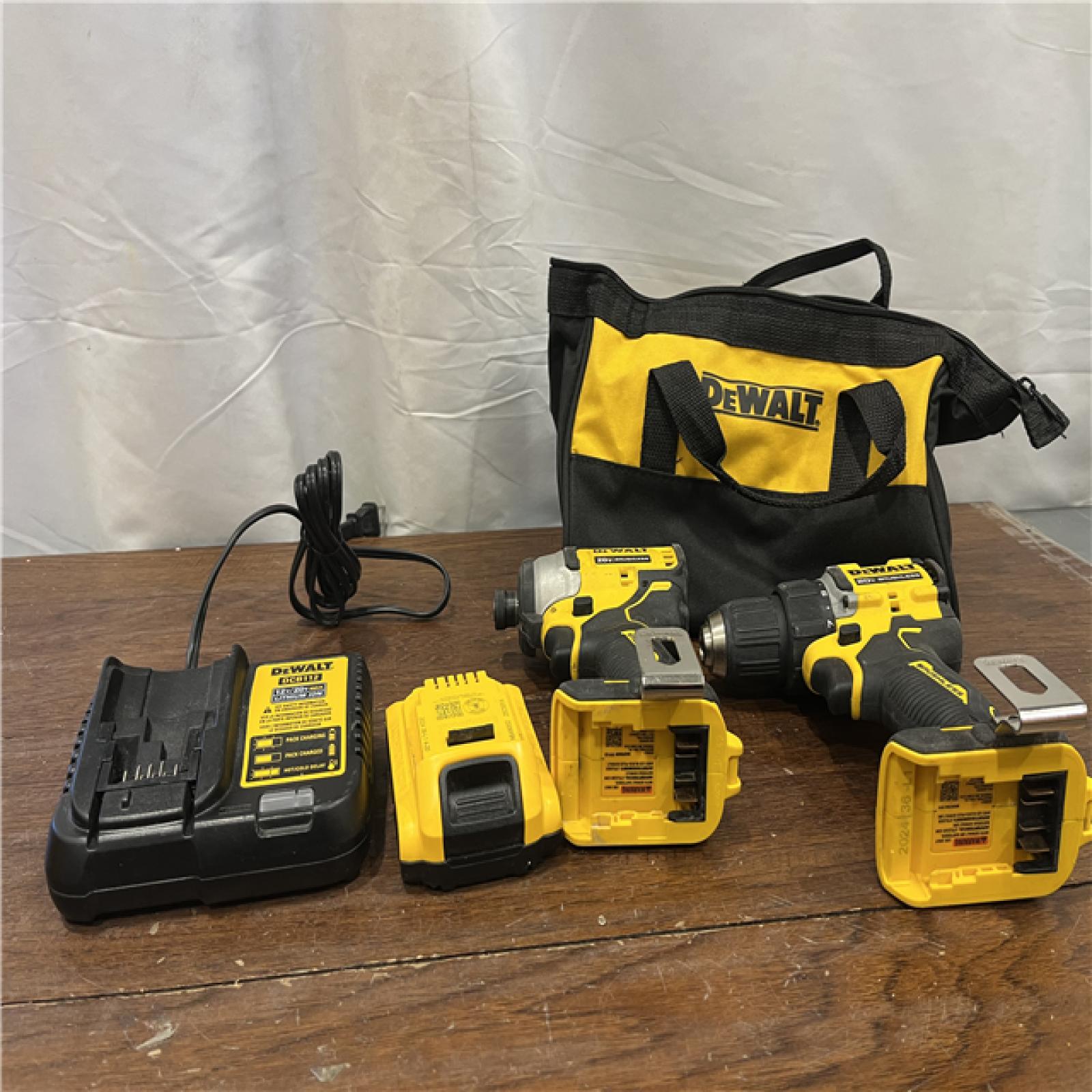 AS-ISDewalt DCK225D2 20V MAX ATOMIC Brushless Compact Lithium-Ion 1/2 in. Cordless Drill Driver and 1/4 in. Impact Driver Combo Kit with 2 Batteries 2 Ah