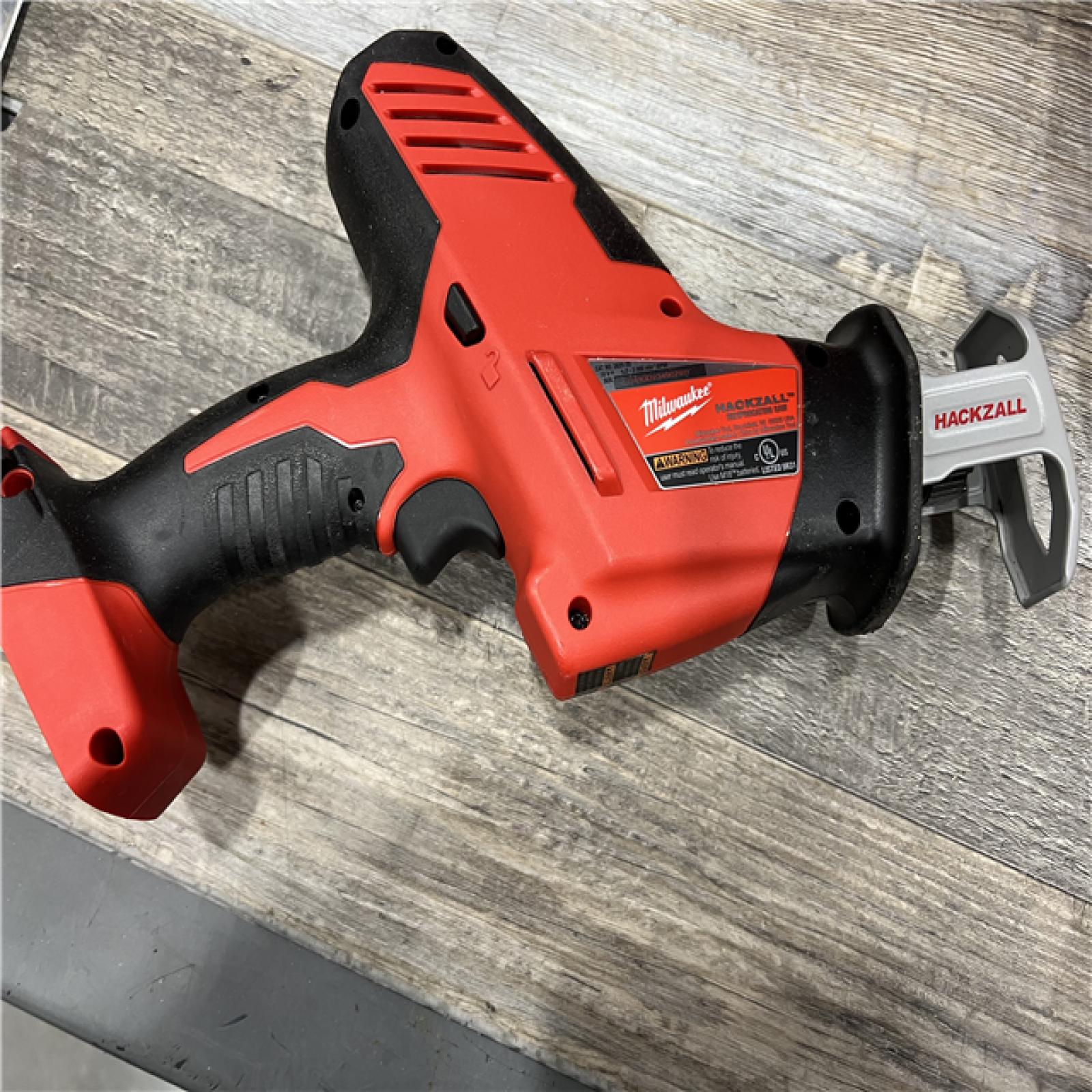 AS-IS MILWAUKEE M18 18-Volt Lithium-Ion Brushless Cordless Combo Kit (4-Tool) with 2-Batteries, 1-Charger and Tool Bag