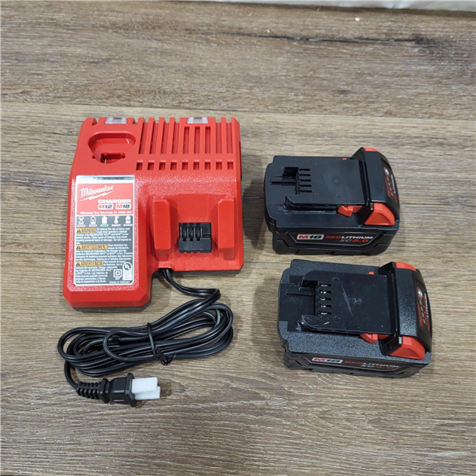 AS-IS Milwaukee M18 18-Volt Lithium-Ion XC Starter Kit with Two 5.0Ah Batteries / Charger (48-59-1852B)