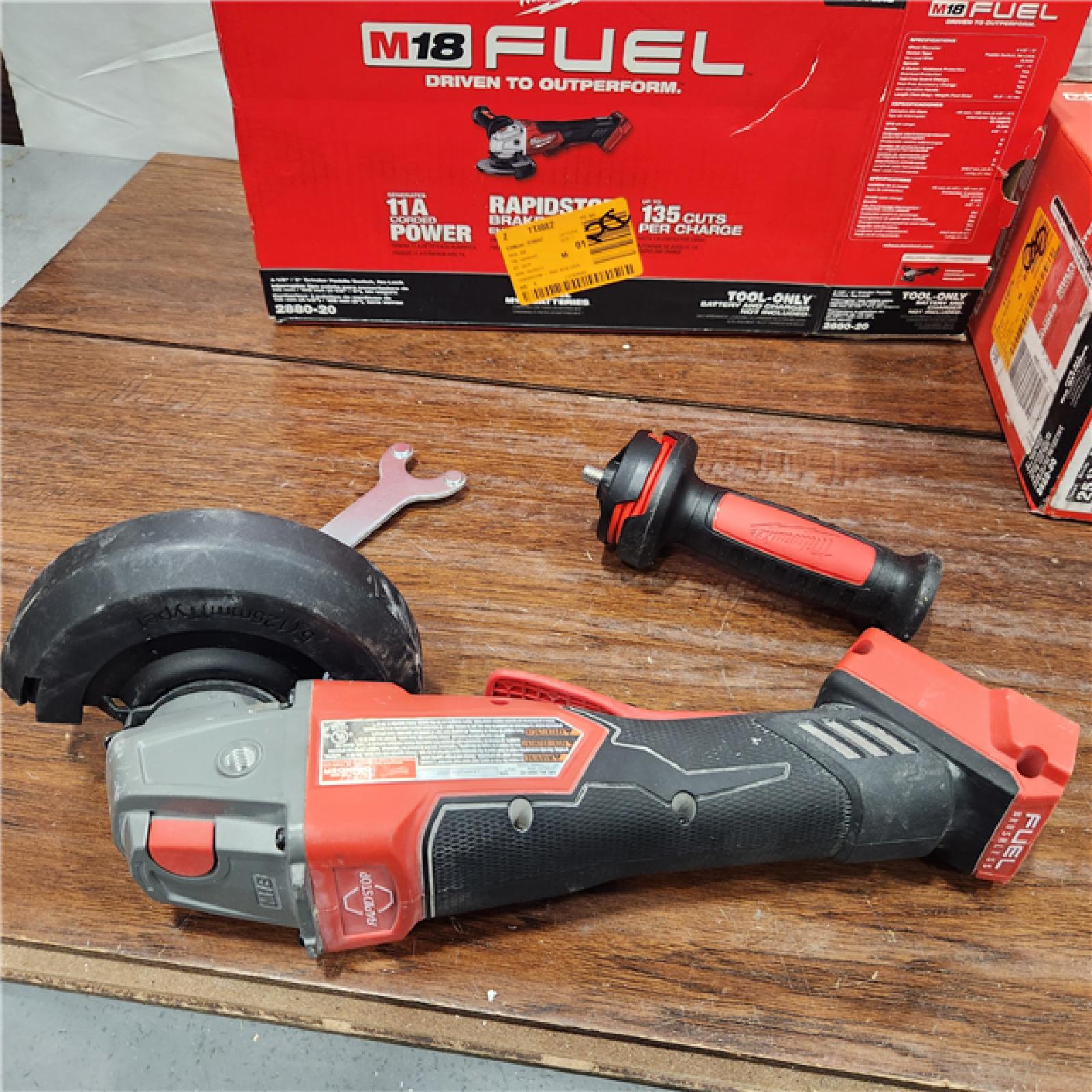 AS-IS Milwaukee 2880-20 M18 FUEL 18-Volt Lithium-Ion Brushless Cordless 4-1/2 in./5 in. Grinder W/Paddle Switch (Tool-Only)