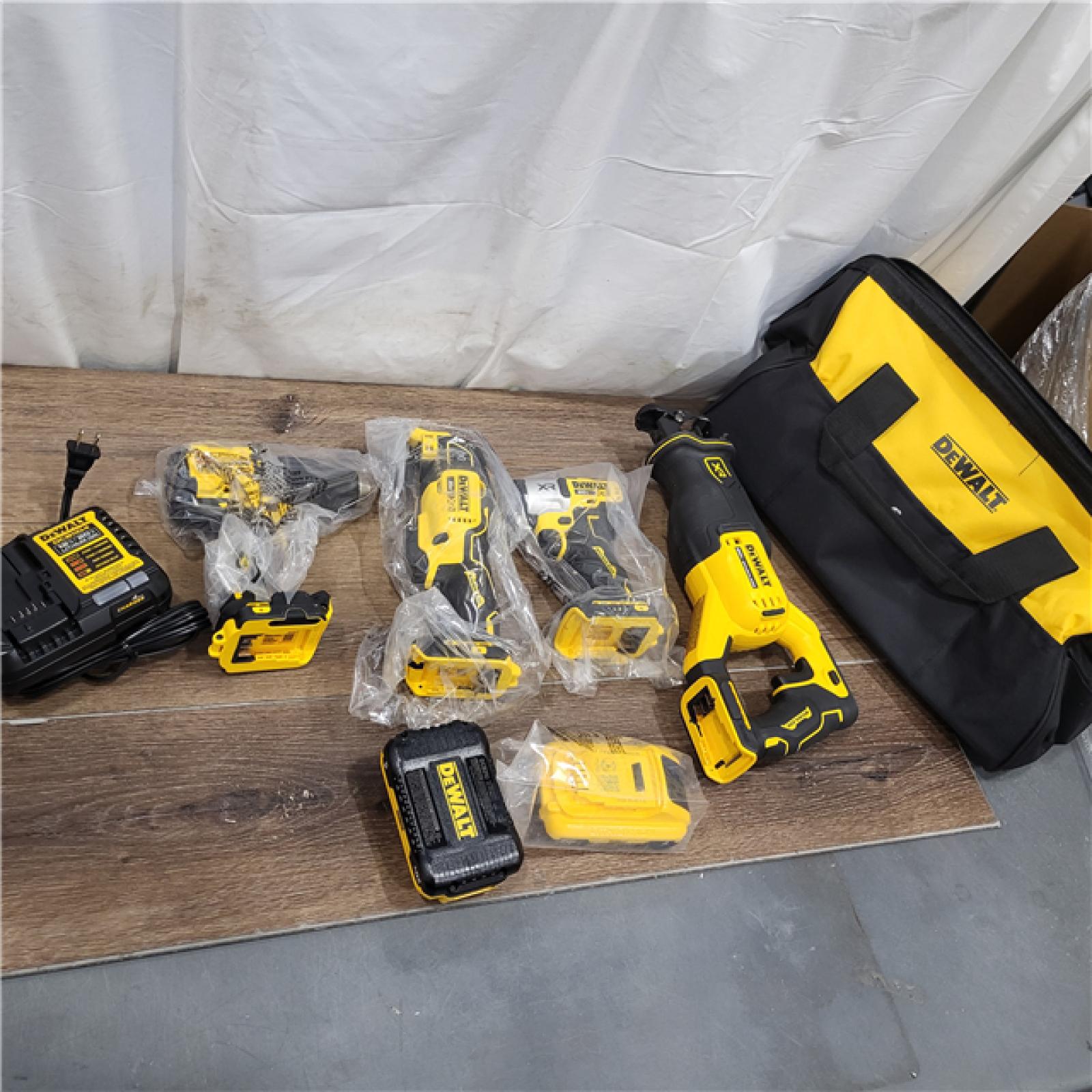 New AS-IS DEWALT 20-Volt Maximum Lithium-Ion Cordless 4-Tool Combo Kit with (2) 4 Ah Batteries and Charger