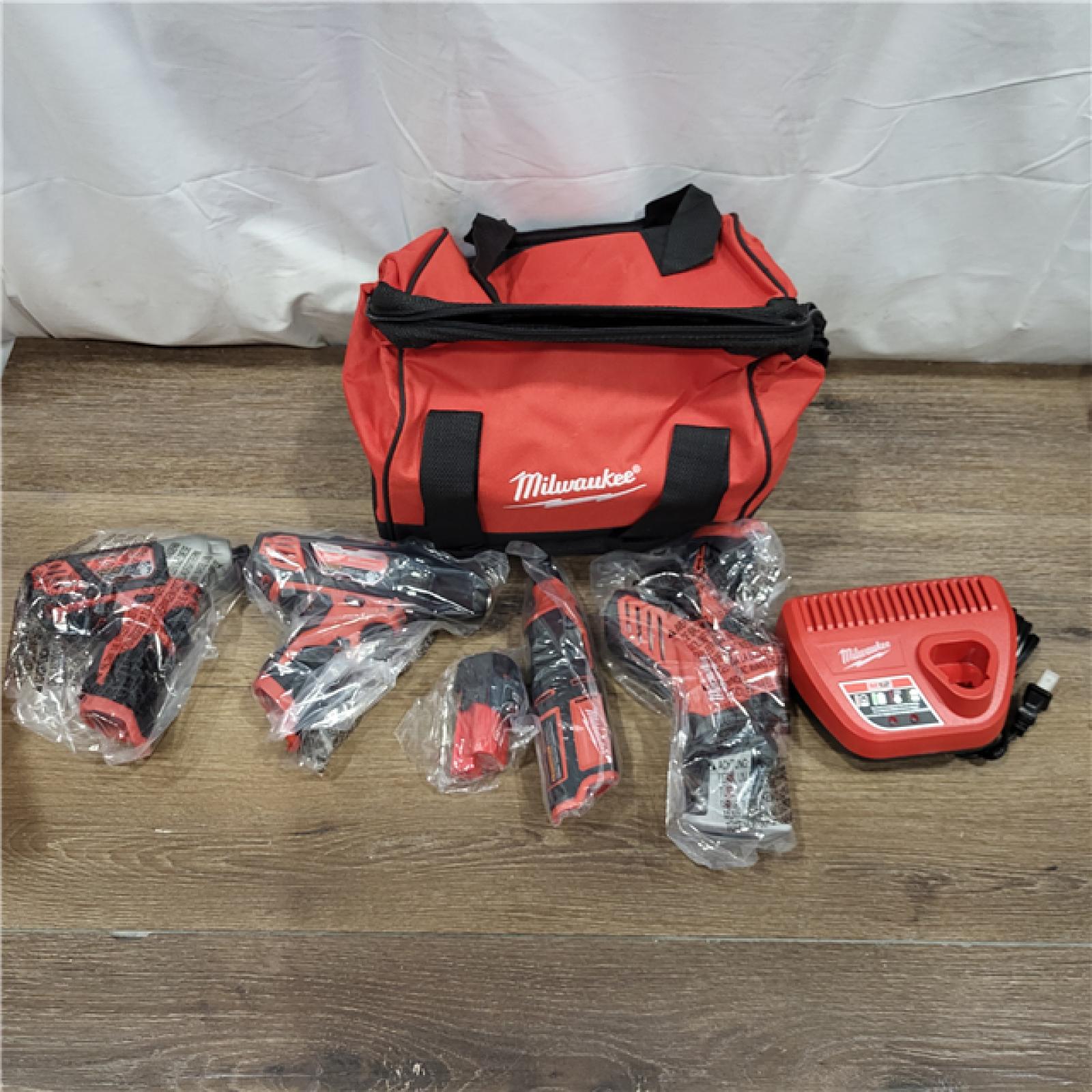 AS-IS M12 12V Lithium-Ion Cordless 4-Tool Combo Kit with (2) Compact 1.5Ah Batteries and Charger