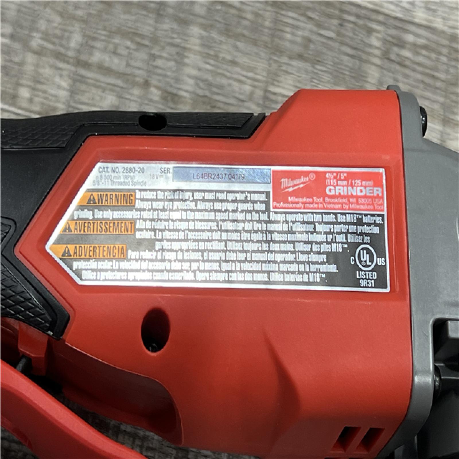 AS-IS Milwaukee 2880-20 M18 FUEL 18-Volt Lithium-Ion Brushless Cordless 4-1/2 in./5 in. Grinder W/Paddle Switch (Tool-Only)