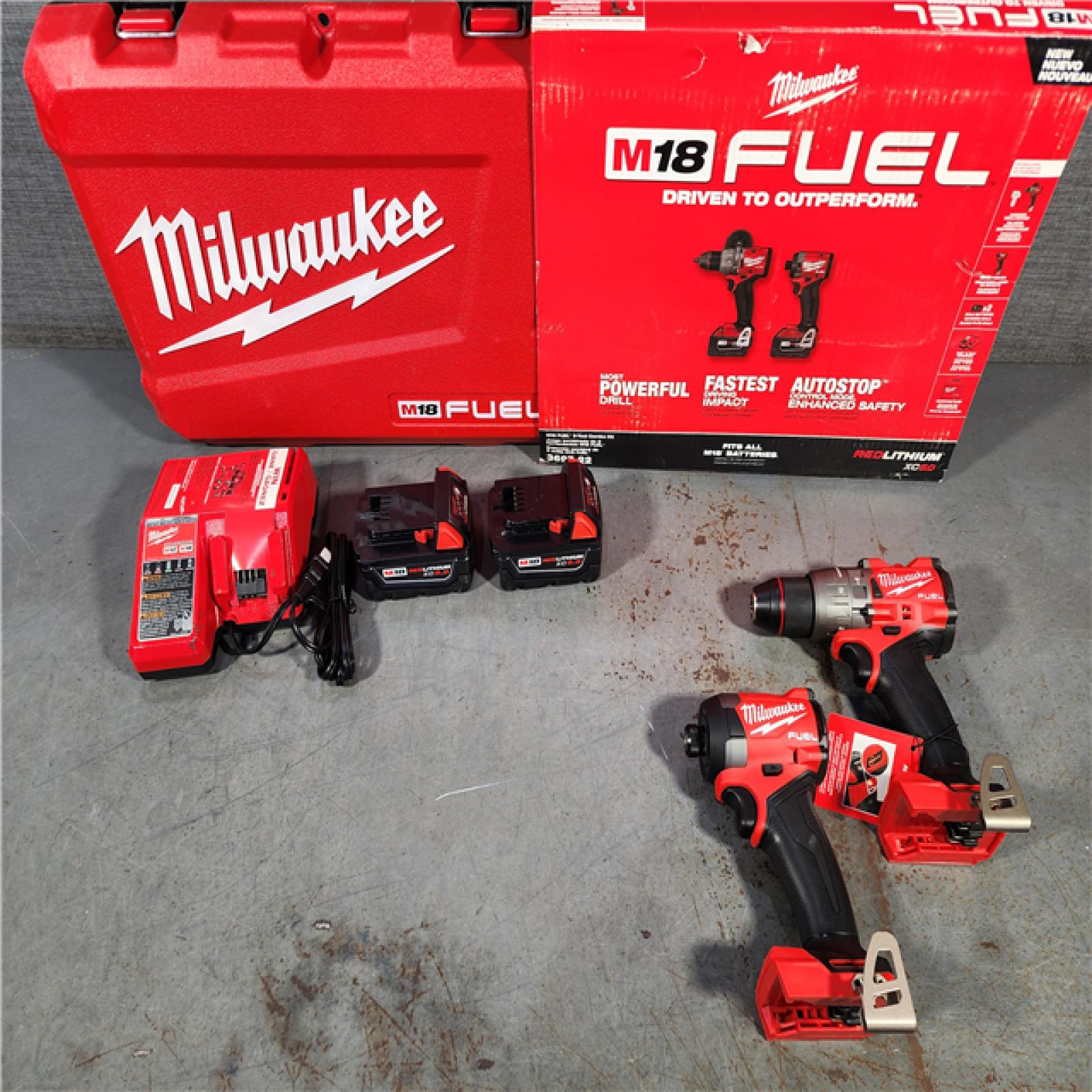 HOUSTON LOCATION - AS-IS (APPEARS LIKE NEW) Milwaukee M18 FUEL 18V Lithium-Ion Brushless Cordless Hammer Drill and Impact Driver Combo Kit (2-Tool) with 2 Batteries