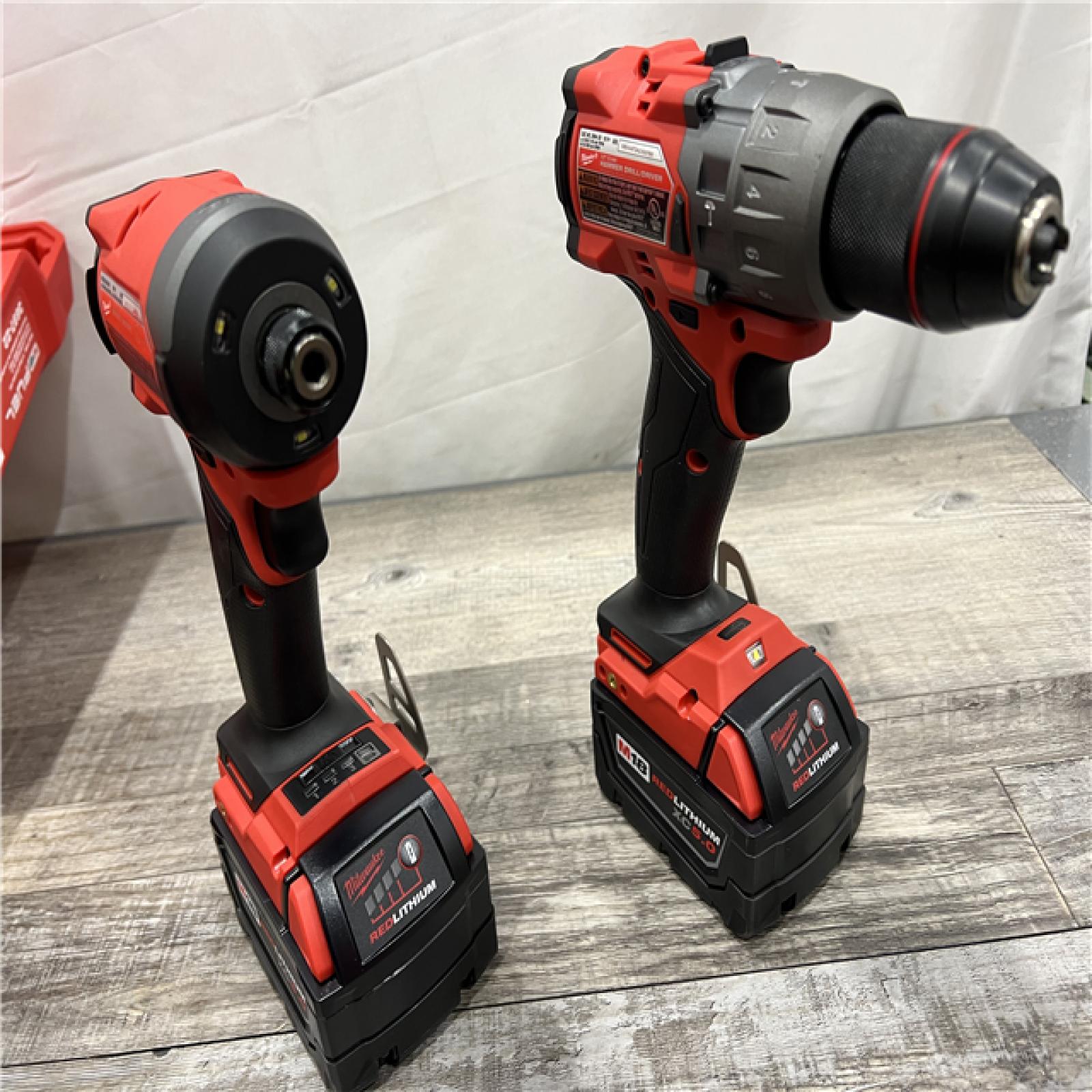 AS-IS Milwaukee M18 FUEL 18V Lithium-Ion Brushless Cordless Hammer Drill and Impact Driver Combo Kit (2-Tool) with 2 Batteries