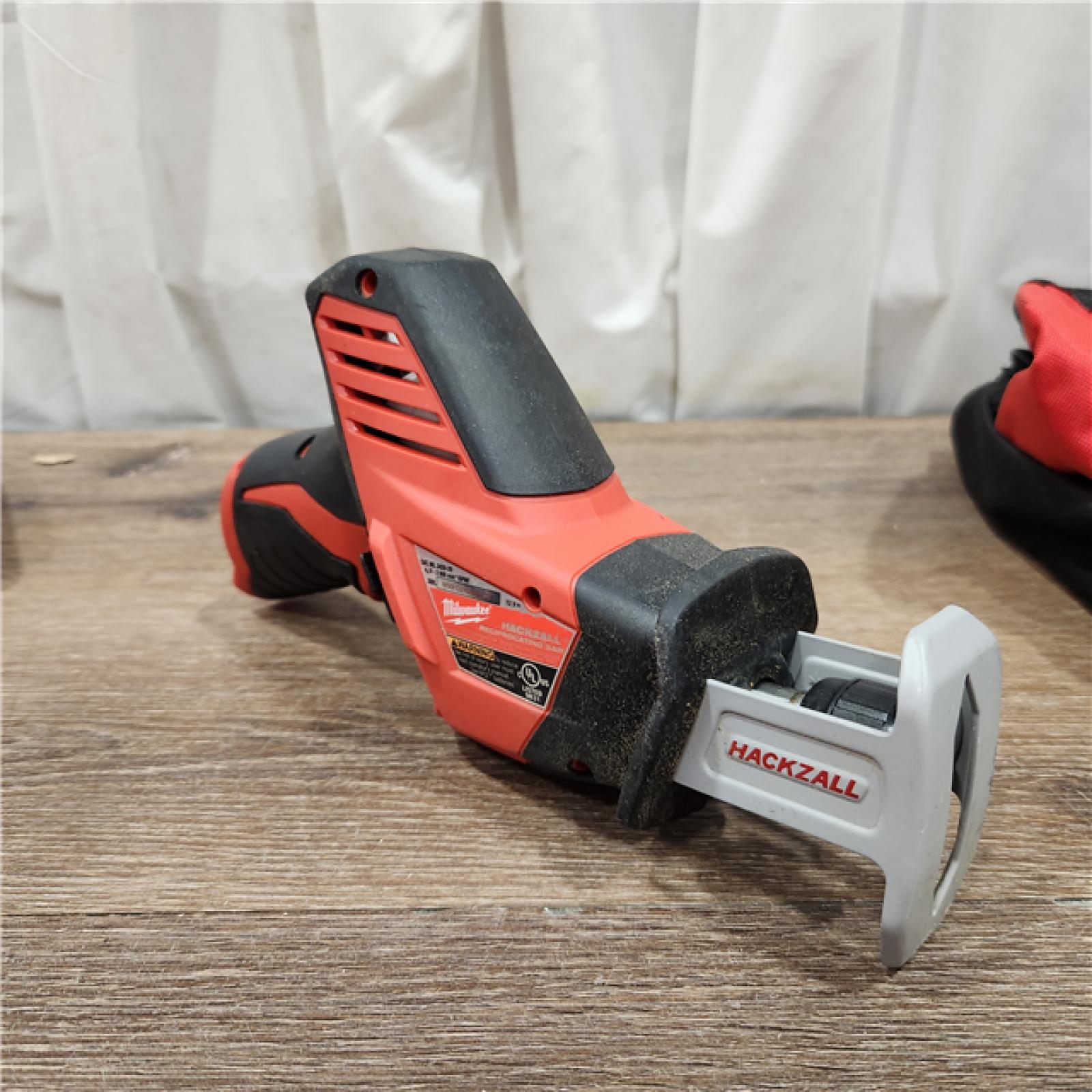 AS-IS MILWAUKEE M12 12V Lithium-Ion Cordless Combo Kit (5-Tool) with Two 1.5Ah Batteries, Charger & Tool Bag