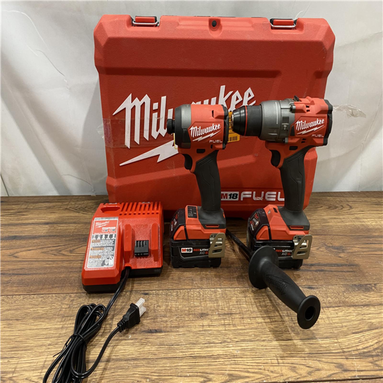 AS IS Milwaukee M18 FUEL 18V Lithium-Ion Brushless Cordless Hammer Drill and Impact Driver Combo Kit (2-Tool) with 2 Batteries