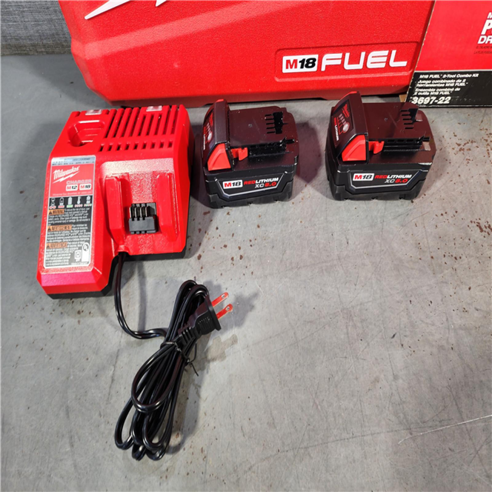 HOUSTON LOCATION - AS-IS Milwaukee M18 FUEL 18V Lithium-Ion Brushless Cordless Hammer Drill and Impact Driver Combo Kit (2-Tool) with 2 Batteries