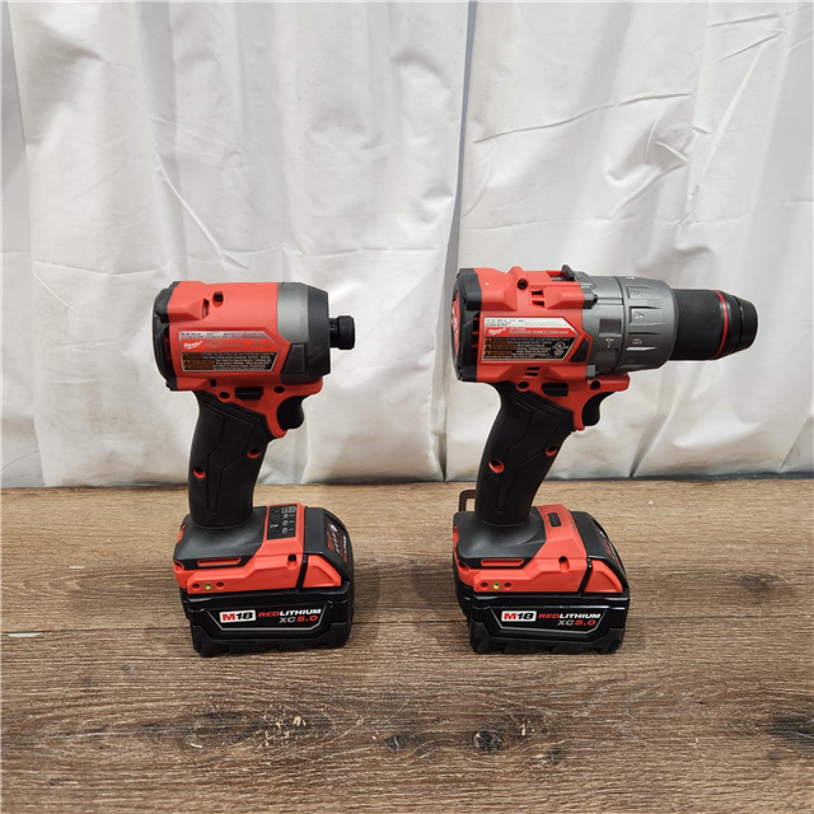 AS-IS Milwaukee M18 FUEL 18V Lithium-Ion Brushless Cordless Hammer Drill and Impact Driver Combo Kit (2-Tool) with 2 Batteries