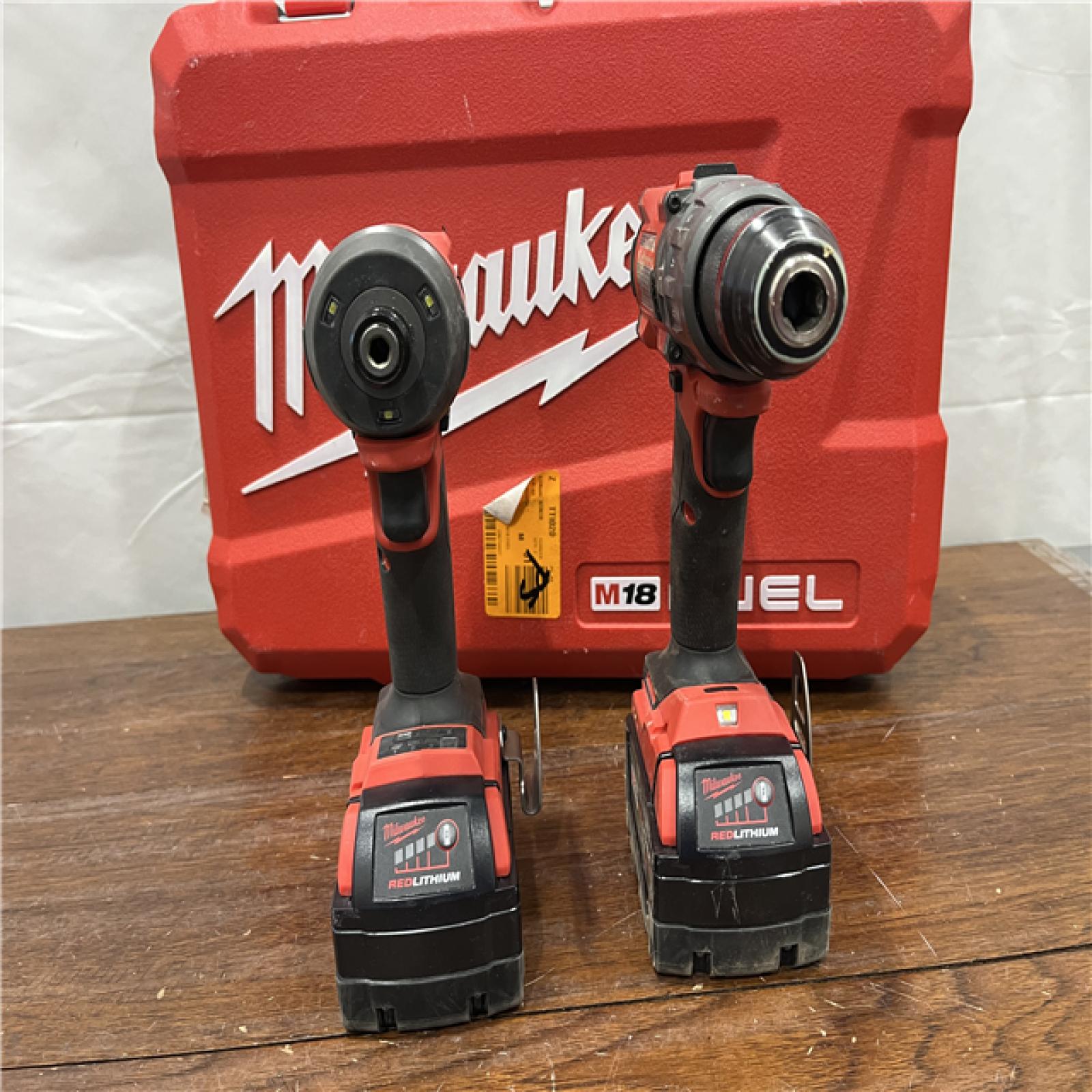 AS-IS Milwaukee M18 FUEL 18V Lithium-Ion Brushless Cordless Hammer Drill and Impact Driver Combo Kit (2-Tool) with 2 Batteries