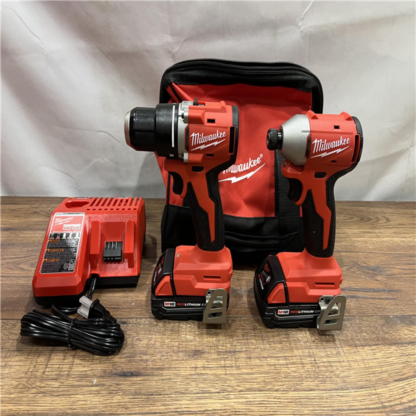 AS IS M18 18V Lithium-Ion Brushless Cordless Compact Drill/Impact Combo Kit (2-Tool) W/(2) 2.0 Ah Batteries, Charger & Bag