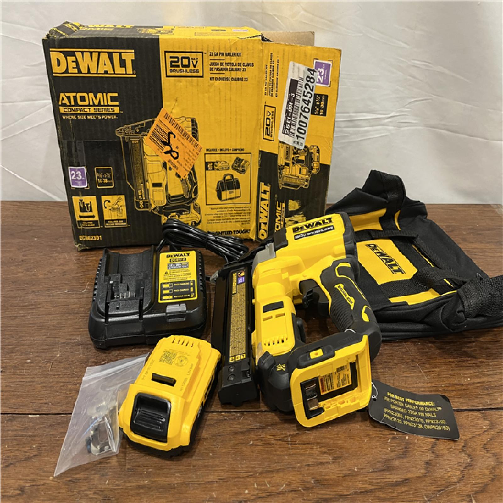 AS-ISDeWalt DCN623D1 20-Volt MAX Atomic Compact Cordless Pin Nailer Kit  Brushless Motor  23 Gauge  Battery - Quantity 1