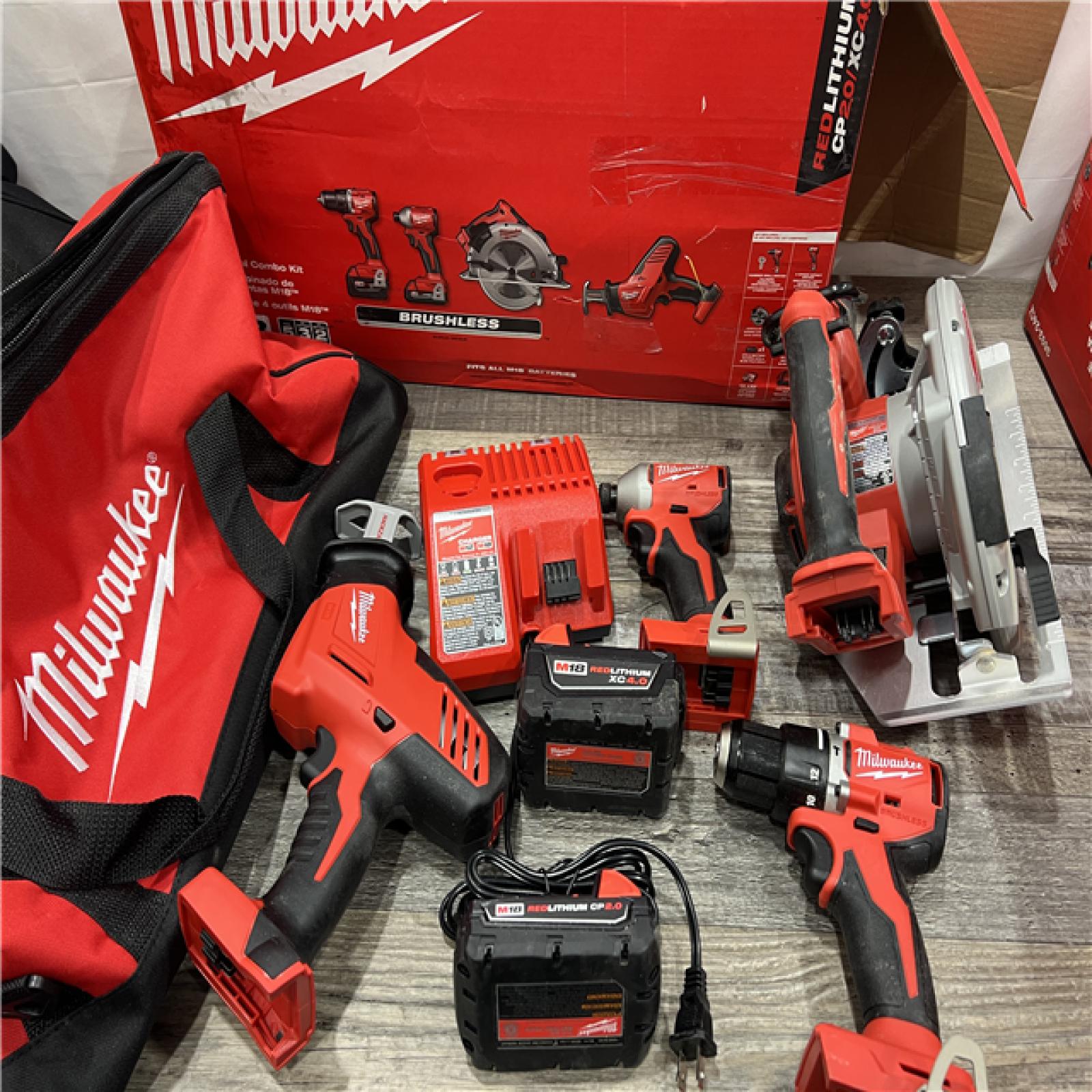 AS-IS MILWAUKEE M18 18-Volt Lithium-Ion Brushless Cordless Combo Kit (4-Tool) with 2-Batteries, 1-Charger and Tool Bag