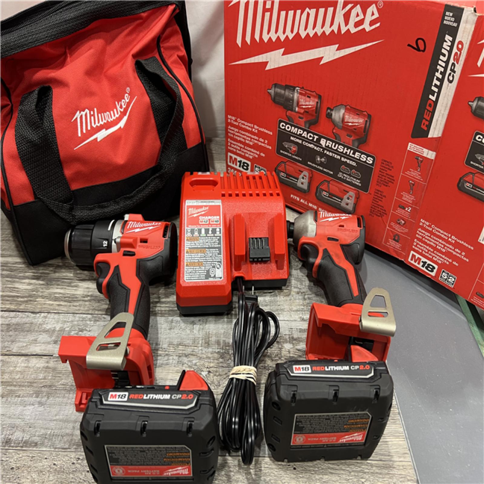 AS-IS MILWAUKEE M18 18V Lithium-Ion Brushless Cordless Compact Drill/Impact Combo Kit (2-Tool) W/(2) 2.0 Ah Batteries, Charger & Bag