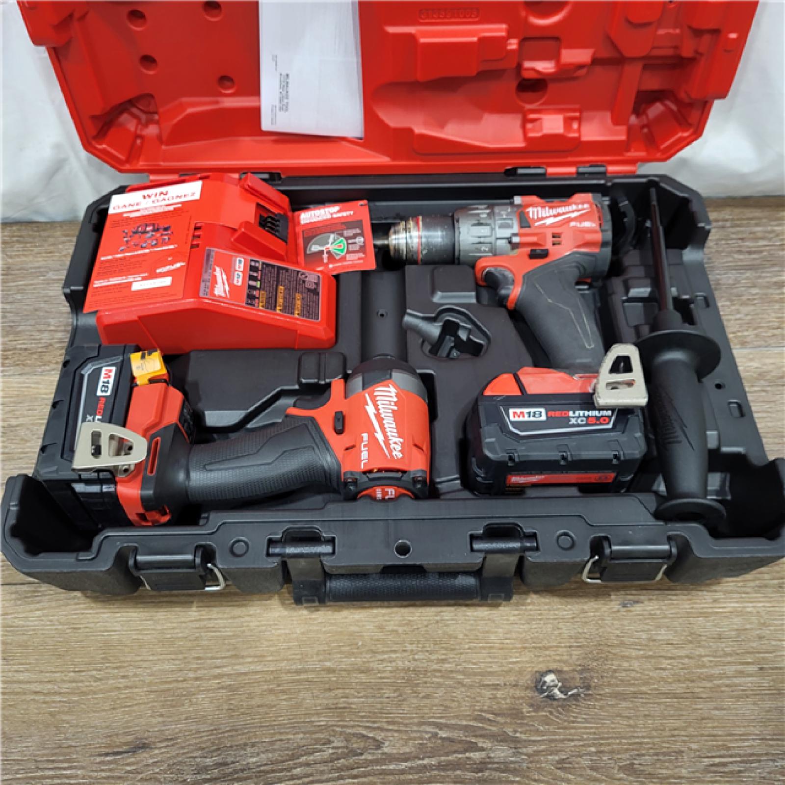 AS-IS M18 FUEL 18V Lithium-Ion Brushless Cordless Hammer Drill and Impact Driver Combo Kit (2-Tool) with 2 Batteries