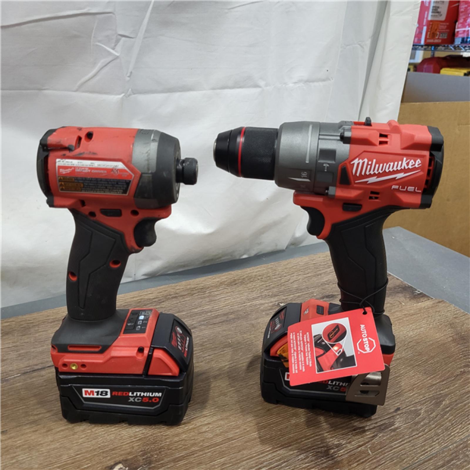 AS-IS Milwaukee M18 FUEL 18V Lithium-Ion Brushless Cordless Hammer Drill and Impact Driver Combo Kit (2-Tool) with 2 Batteries