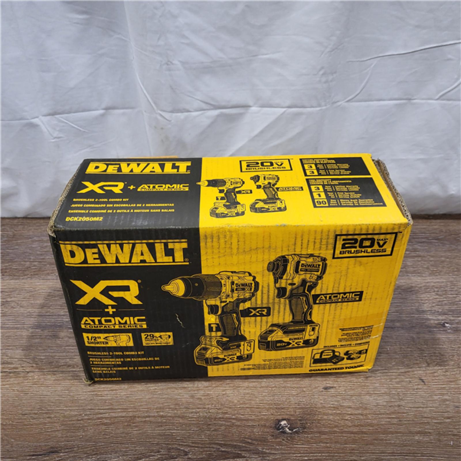 AS-IS DEWALT 20V MAX XR Hammer Drill and ATOMIC Impact Driver 2 Tool Cordless Combo Kit with (2) 4.0Ah Batteries, Charger, and Bag