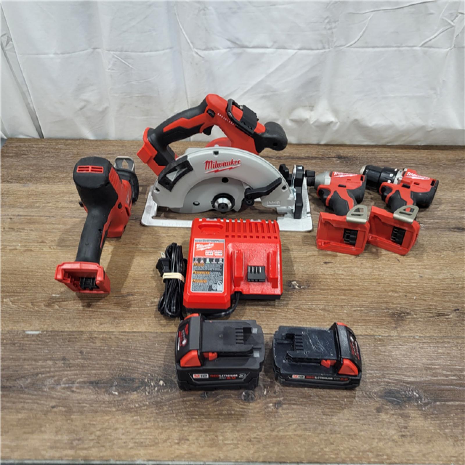 AS-IS M18 18-Volt Lithium-Ion Brushless Cordless Combo Kit (4-Tool) with 2-Batteries, 1-Charger and Tool Bag