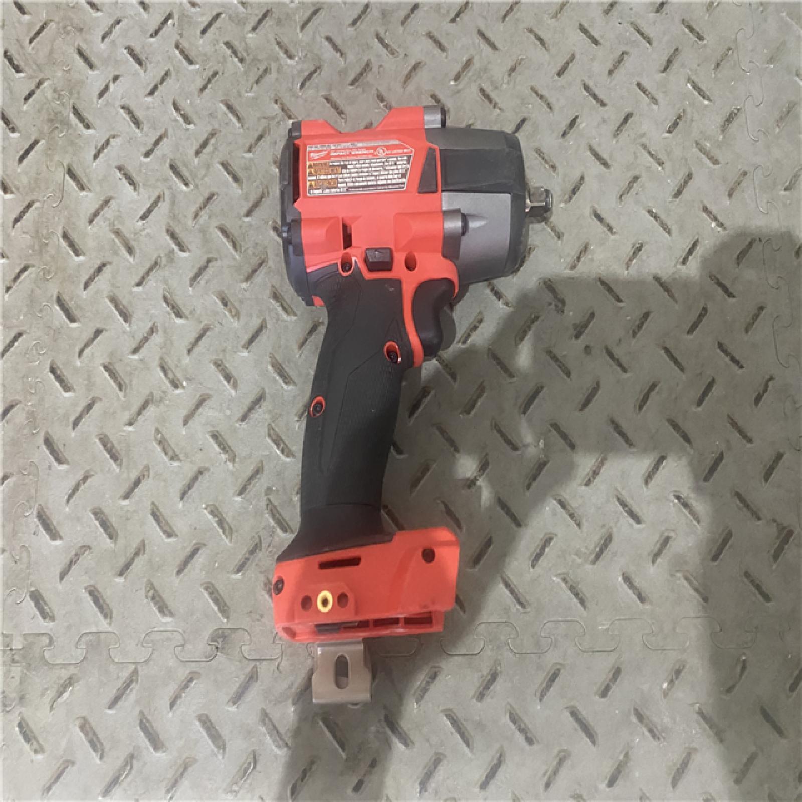 Houston location AS-IS Milwaukee M18 18V Fuel 1/2  Mid-Torque Impact Wrench Cordless Lithium-Ion Brushless with Friction Ring 2962-20