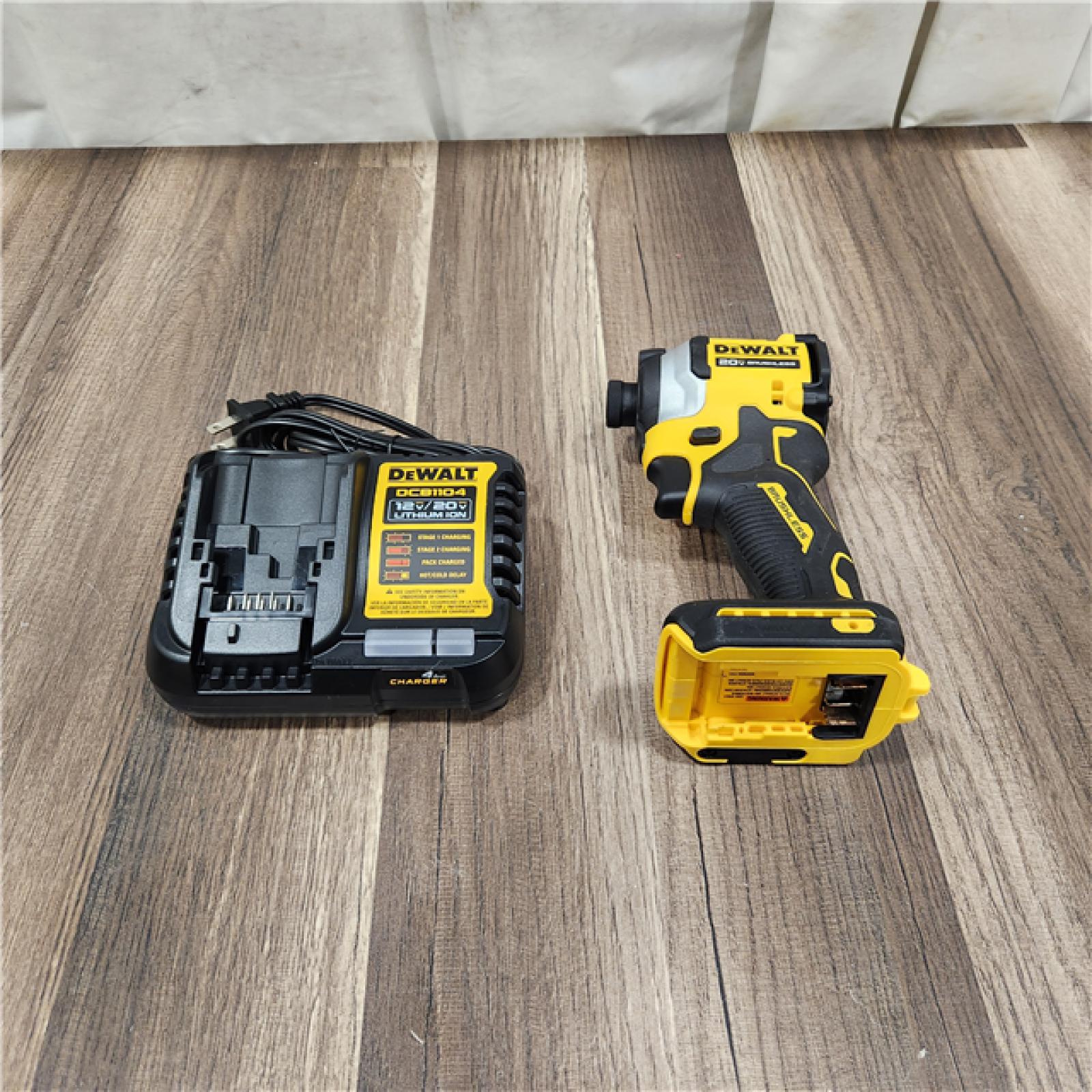 AS IS DEWALT ATOMIC 20V MAX Lithium-Ion Cordless 1/4 in. Brushless Impact Driver Kit, 5 Ah Battery, Charger, and Bag