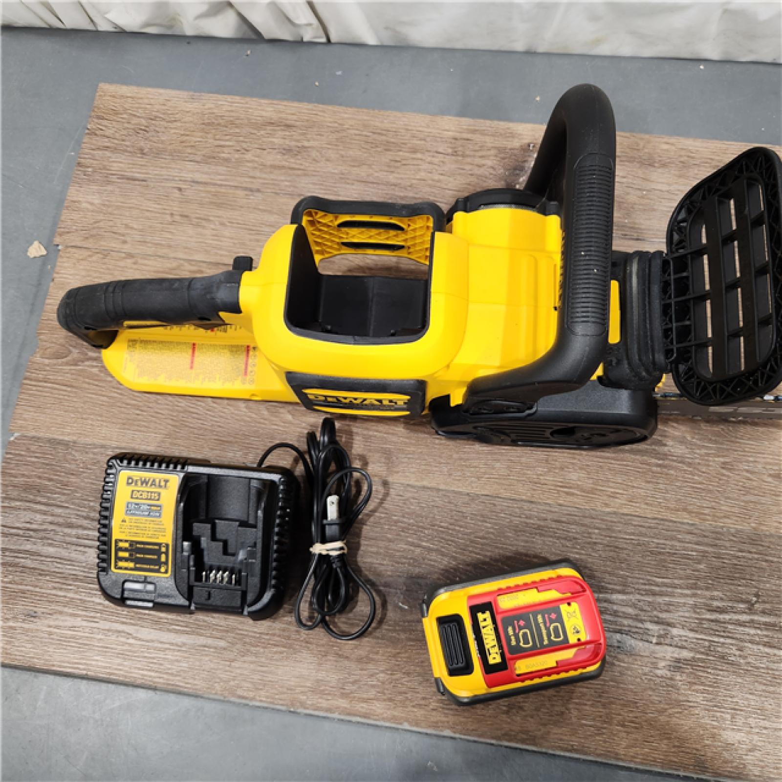 AS-IS DEWALT  FLEXVOLT 60V MAX 16in. Brushless Cordless Battery Powered Chainsaw Kit with (1) FLEXVOLT 2 Ah Battery & Charger