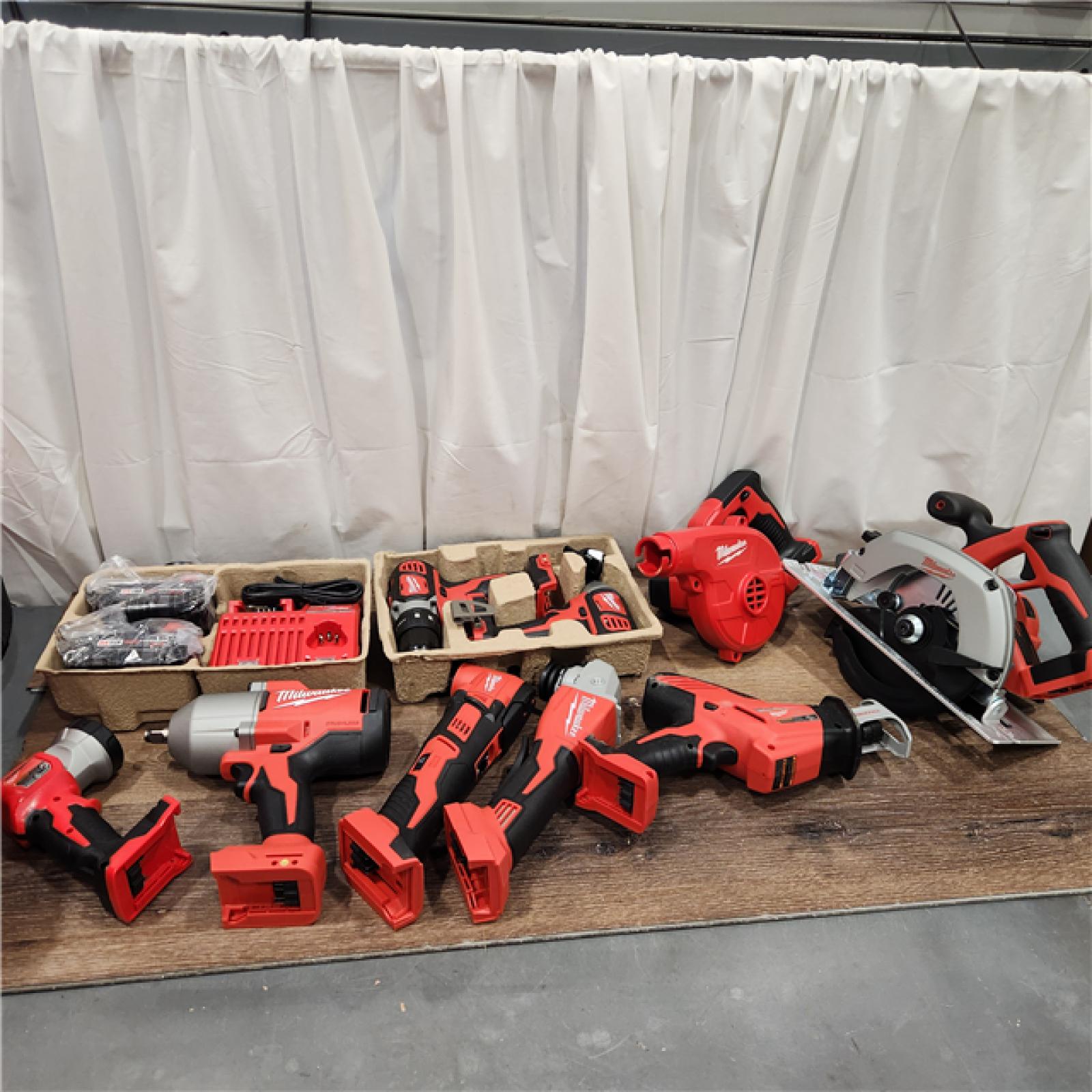 AS-IS MILWAUKEE  M18 18-Volt Lithium-Ion Cordless Combo Kit (9-Tool) with (2) Batteries, Charger, and Tool Bag