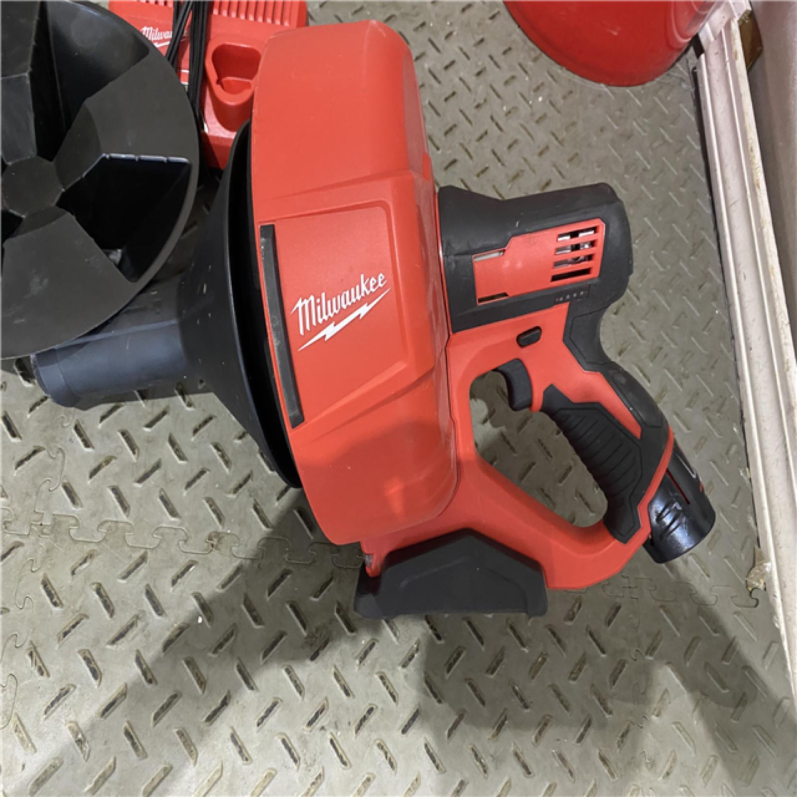 Houston location AS-IS MILWAUKEE M12 12-V Lithium-Ion Cordless Drain Snake Auger W/ (1) 1.5Ah Battery, 5/16 in. X 25 Ft. Cable, Charger, & 5 Gal. Bucket