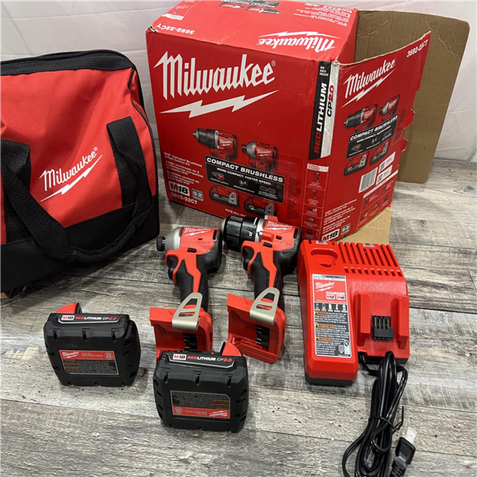 AS-IS MILWAUKEE M18 18V Lithium-Ion Brushless Cordless Compact Drill/Impact Combo Kit (2-Tool) W/(2) 2.0 Ah Batteries, Charger & Bag